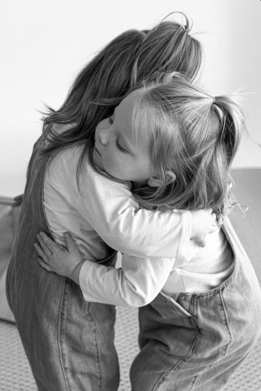 Twins hugging in a photo by Sarah Cullen, South Wales