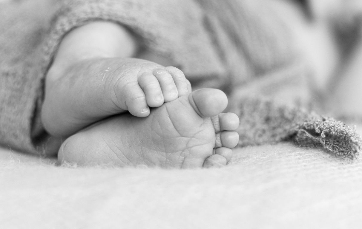 Timeless black and white newborn portrait captured in Cwmbran by Sarah Cullen
