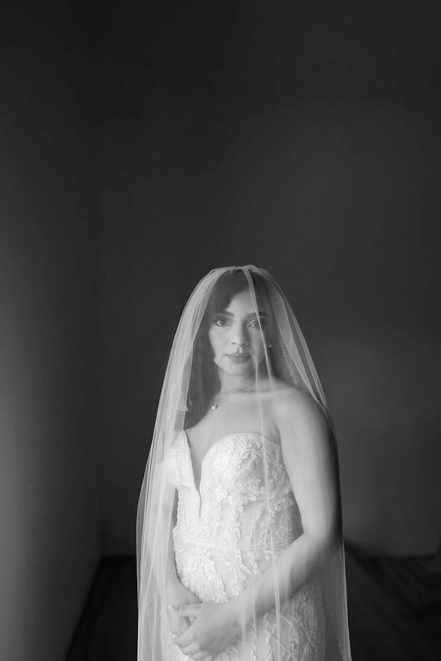 Bridal portrait in Tyler, Texas featuring a bride in a wedding dress and veil with soft, timeless lighting.