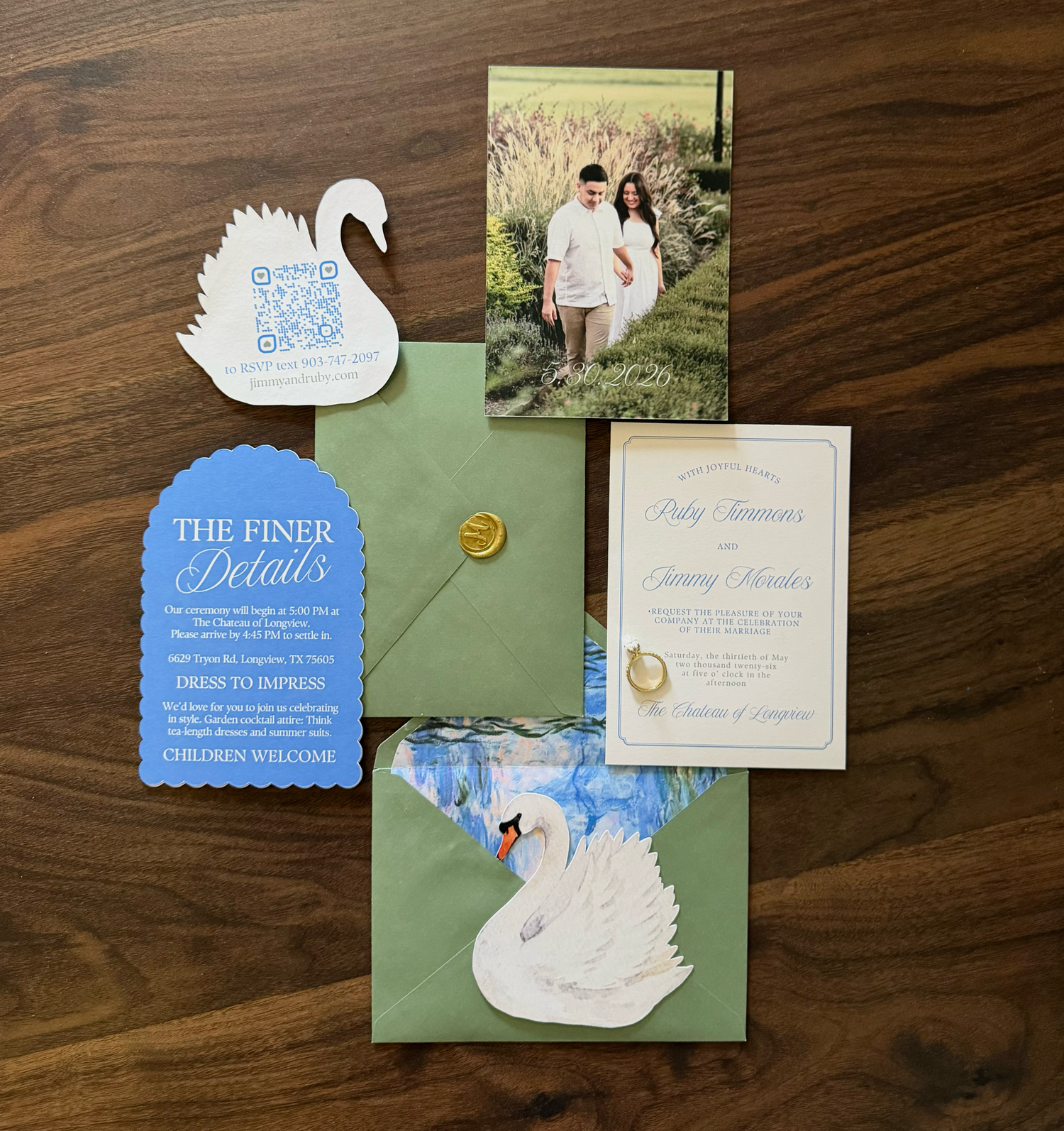 Flat lay of wedding invitation suite with stationery details, rings, and styling for a timeless wedding photography aesthetic