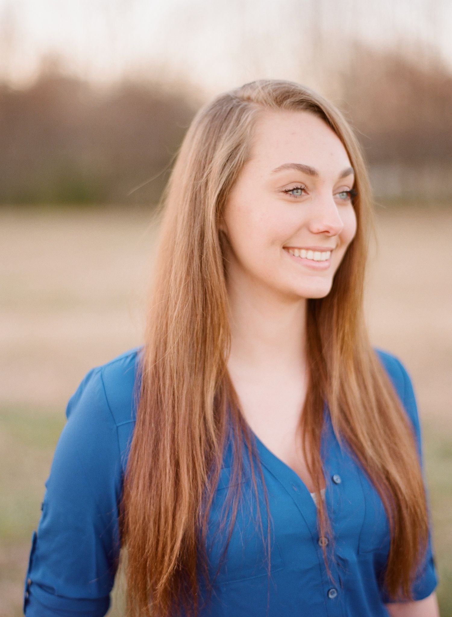 Portrait series showing a woman in a blue blazer smiling warmly against a soft blurred background.