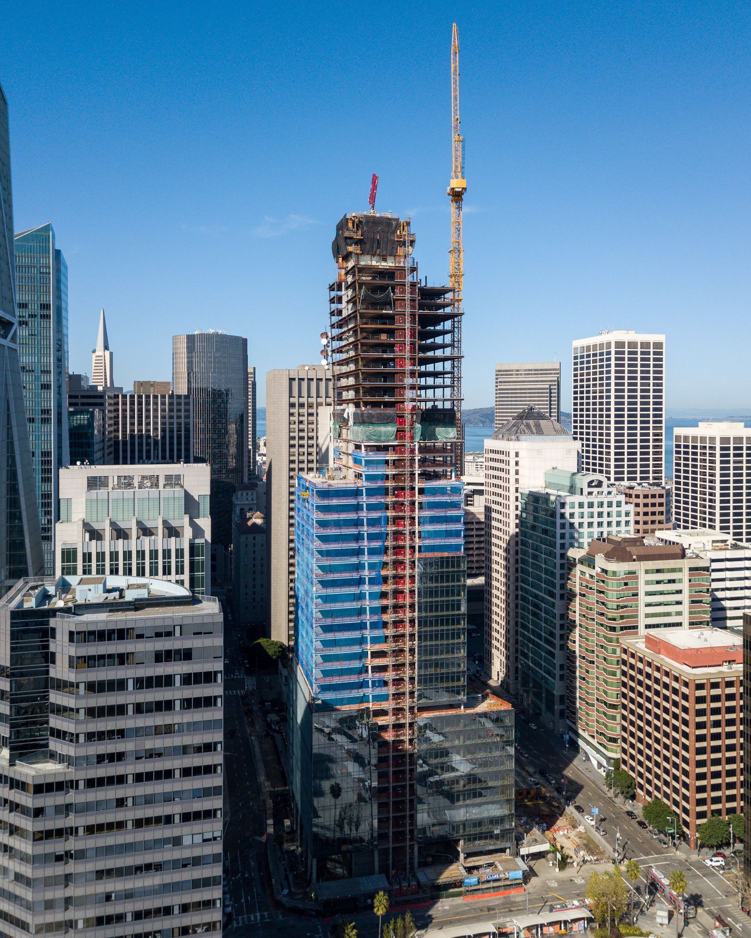 Aerial view of downtown business district showing mix of modern and older office buildings.