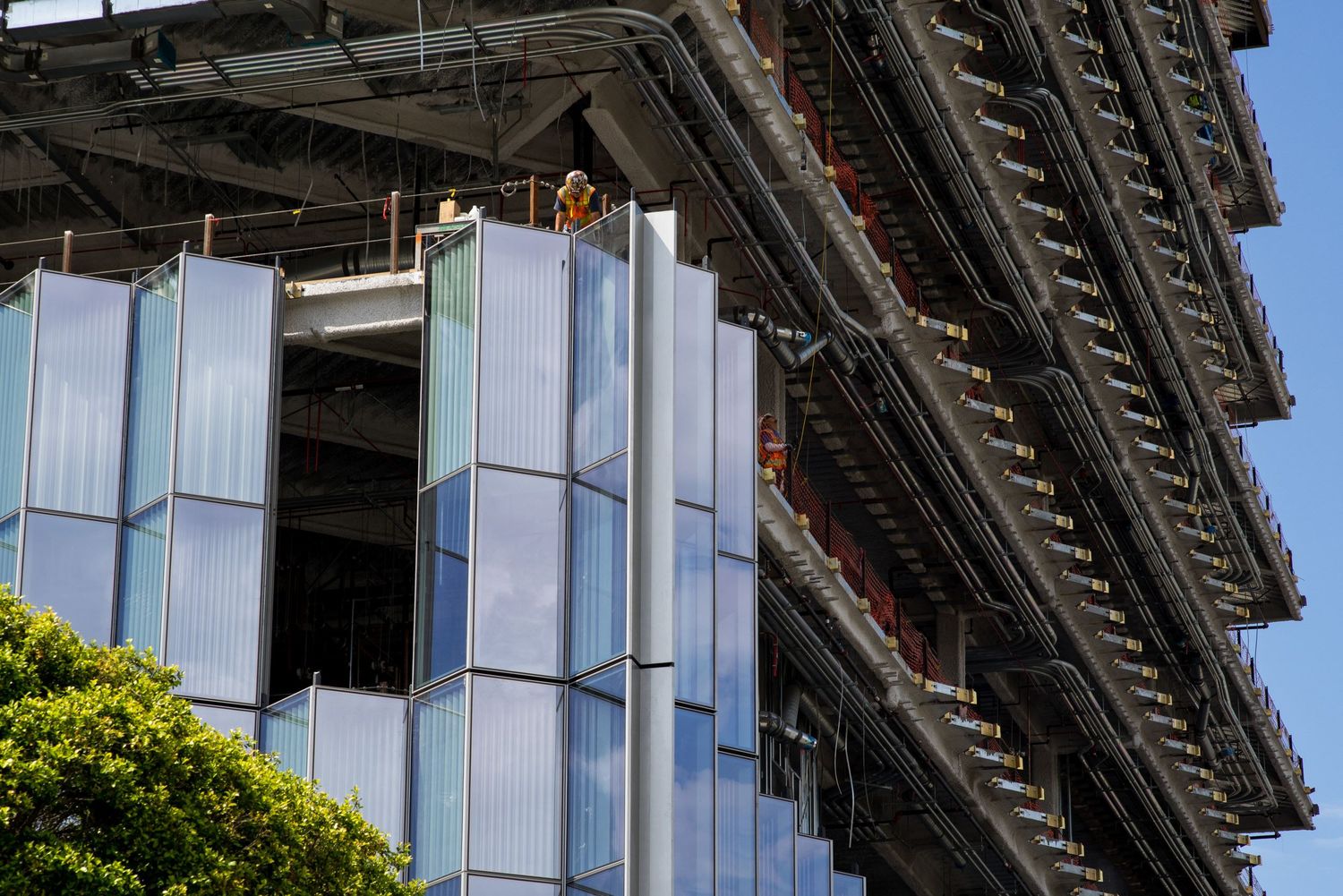 Construction details of a modern building's glass and steel exterior framework.