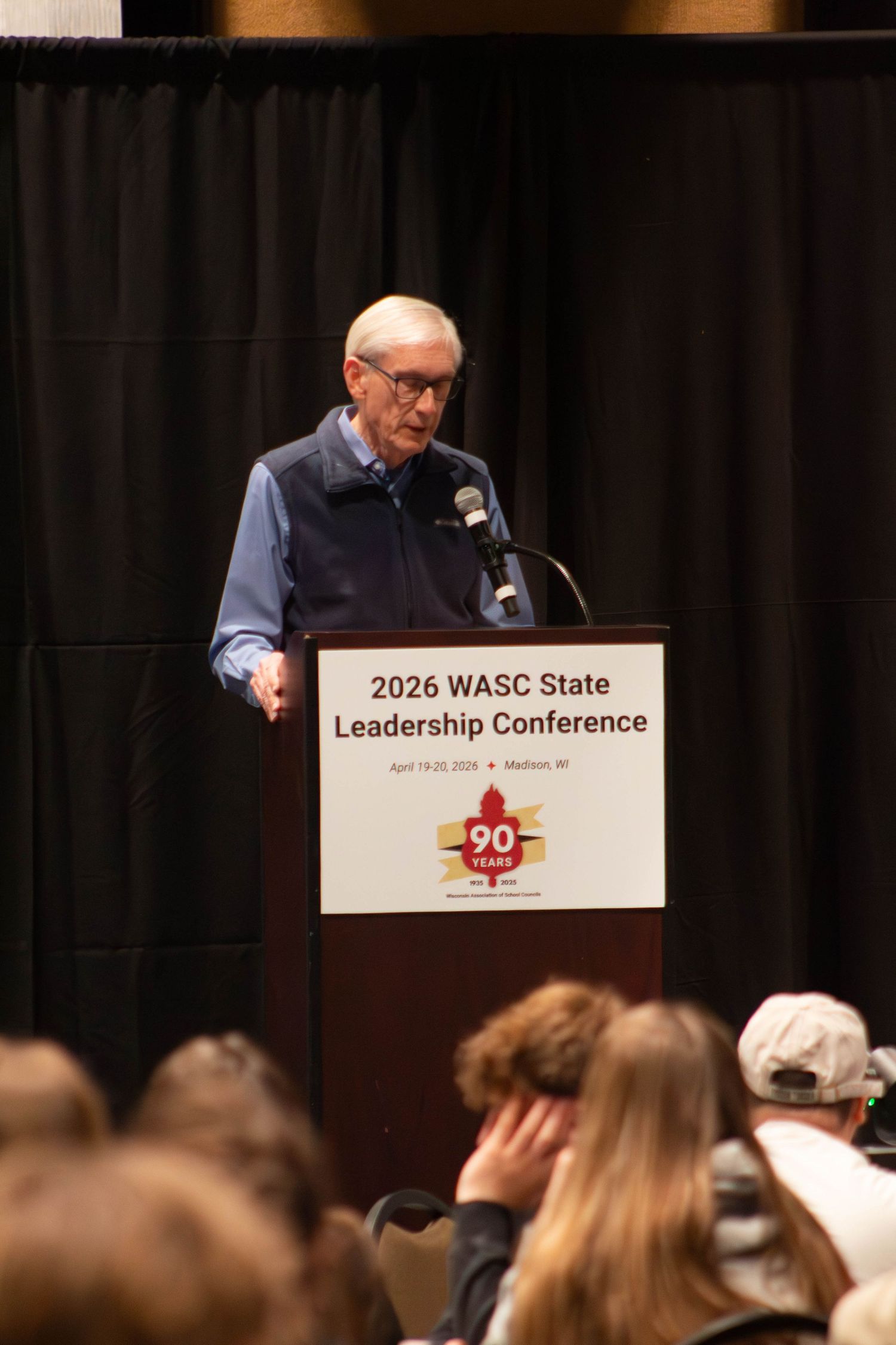 Man speaking at podium during 2026 WASC State Leadership Conference in Madison, WI.