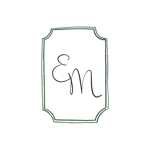 Elegant monogram logo with cursive EM initials inside a decorative green rectangular frame on white background.