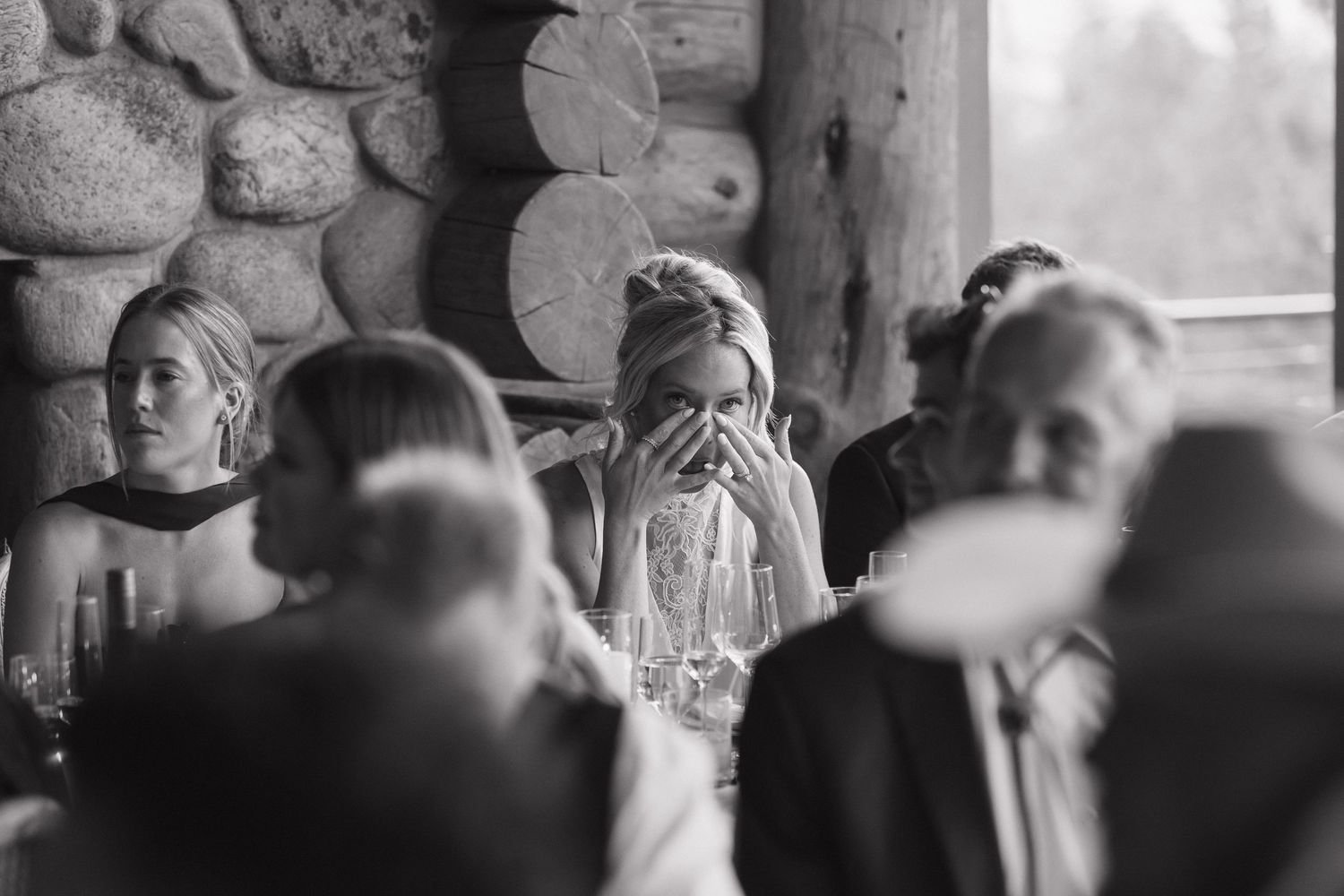 A series of candid black and white wedding moments captured during an intimate celebration.