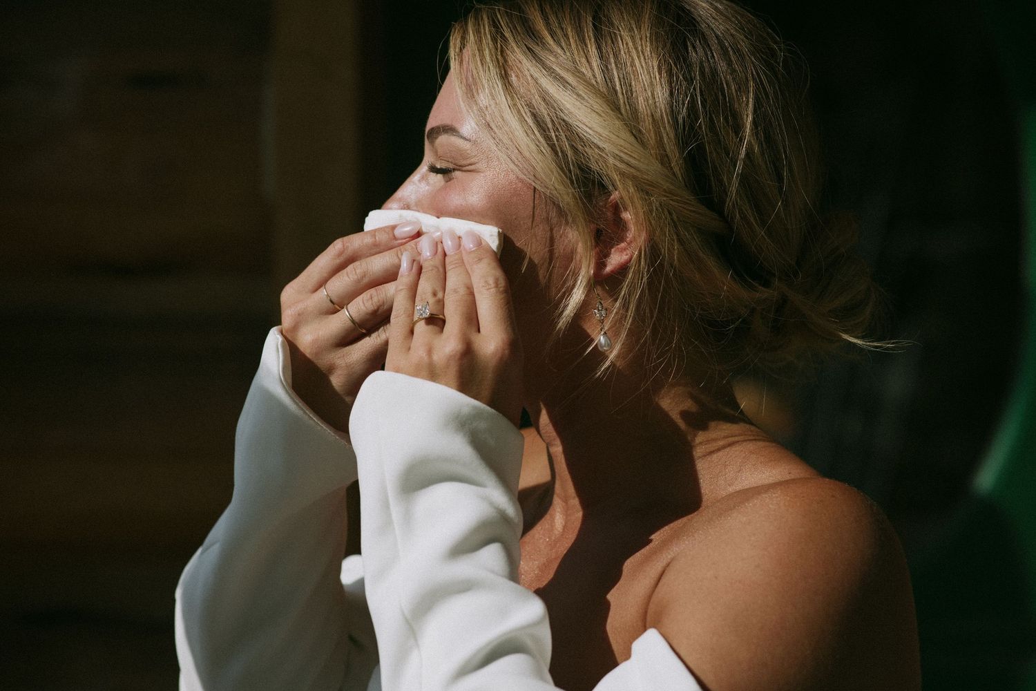 Emotional candid moment captured during a wedding ceremony.