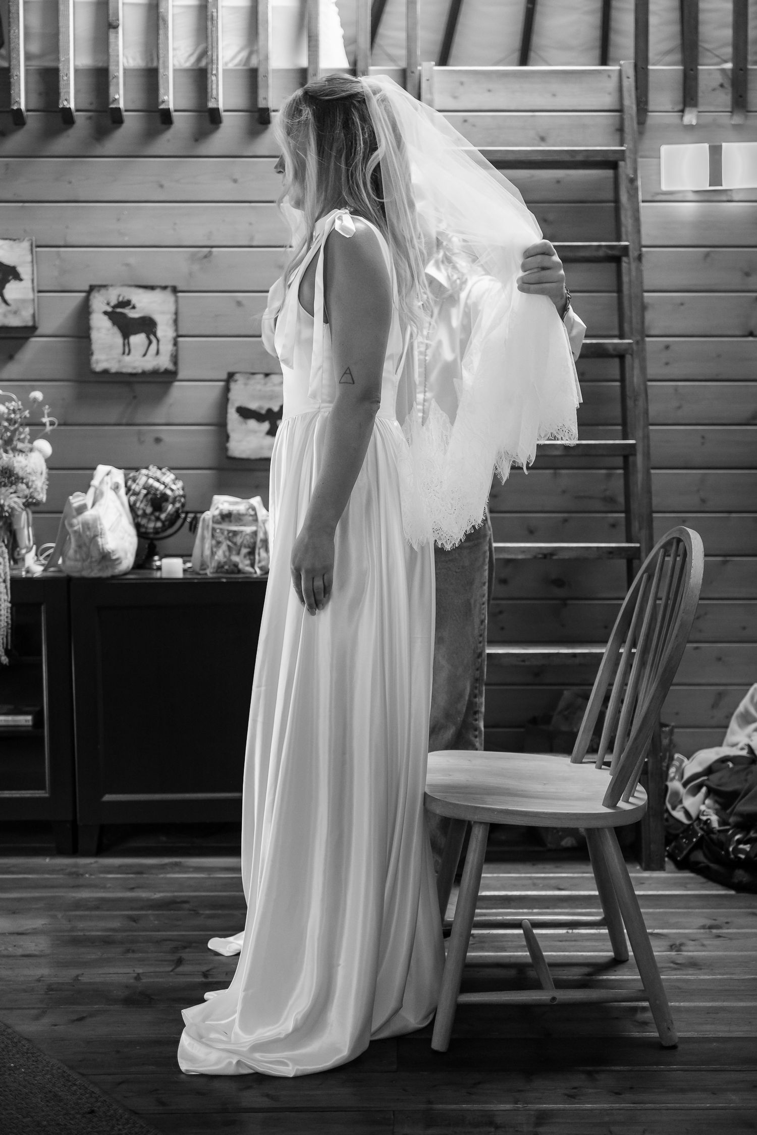 Black and white bridal portrait showcasing veil and wedding dress details
