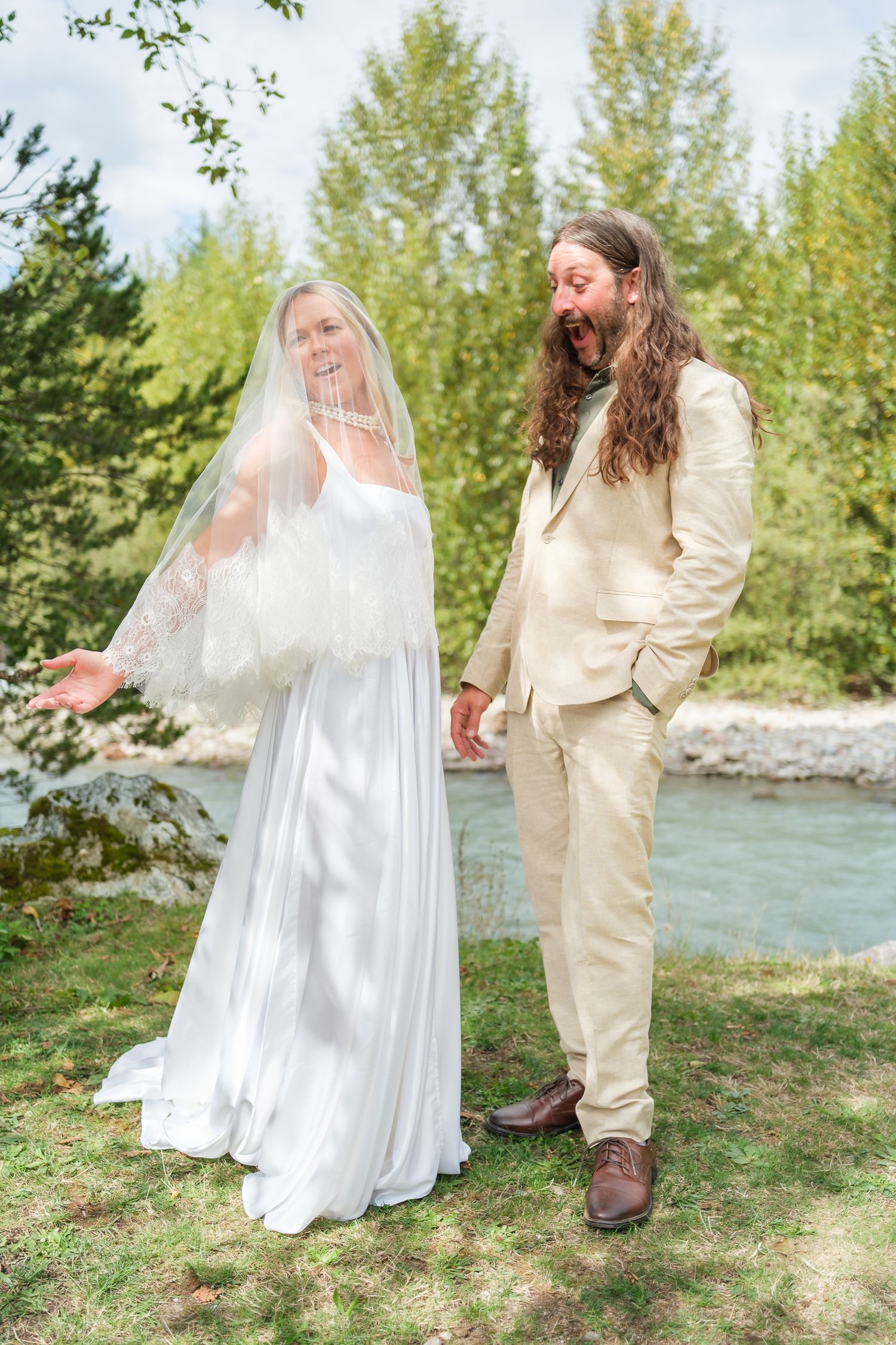Relaxed wedding photography capturing authentic human connection, laughing and happy