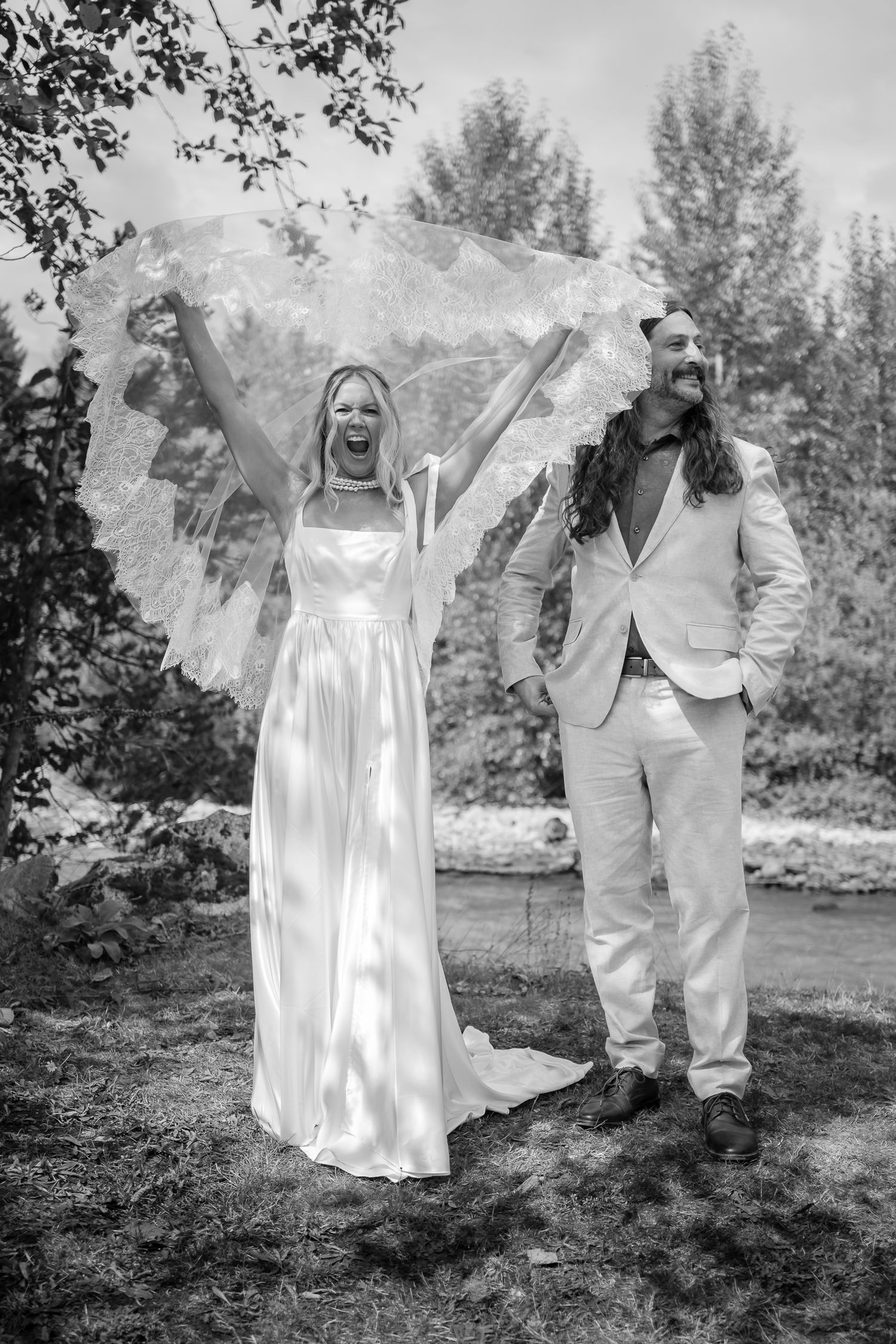 Candid bride and groom embracing during destination elopement