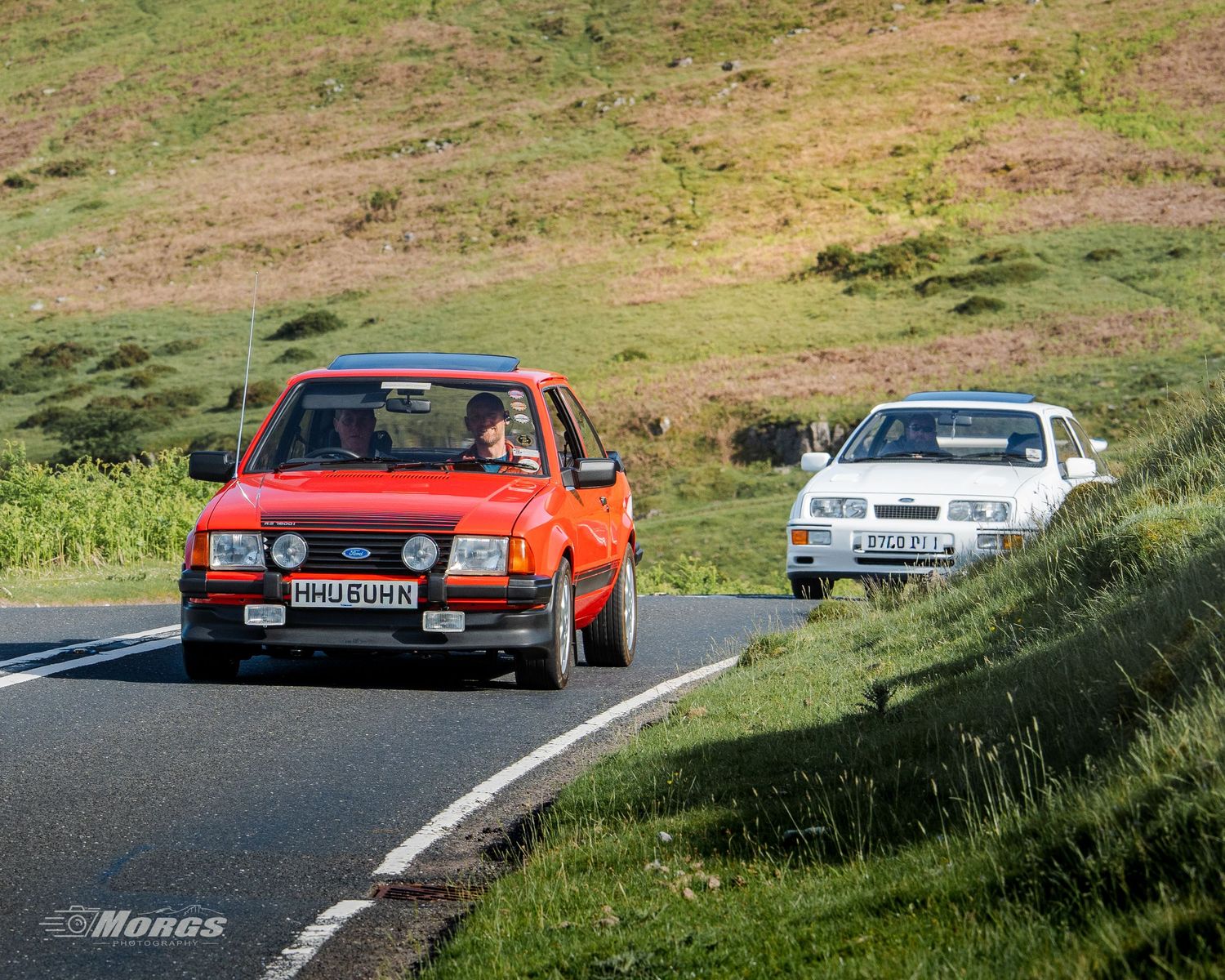 classic arse driving through Welsh countryside