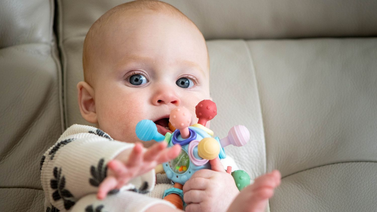 a baby with a toy