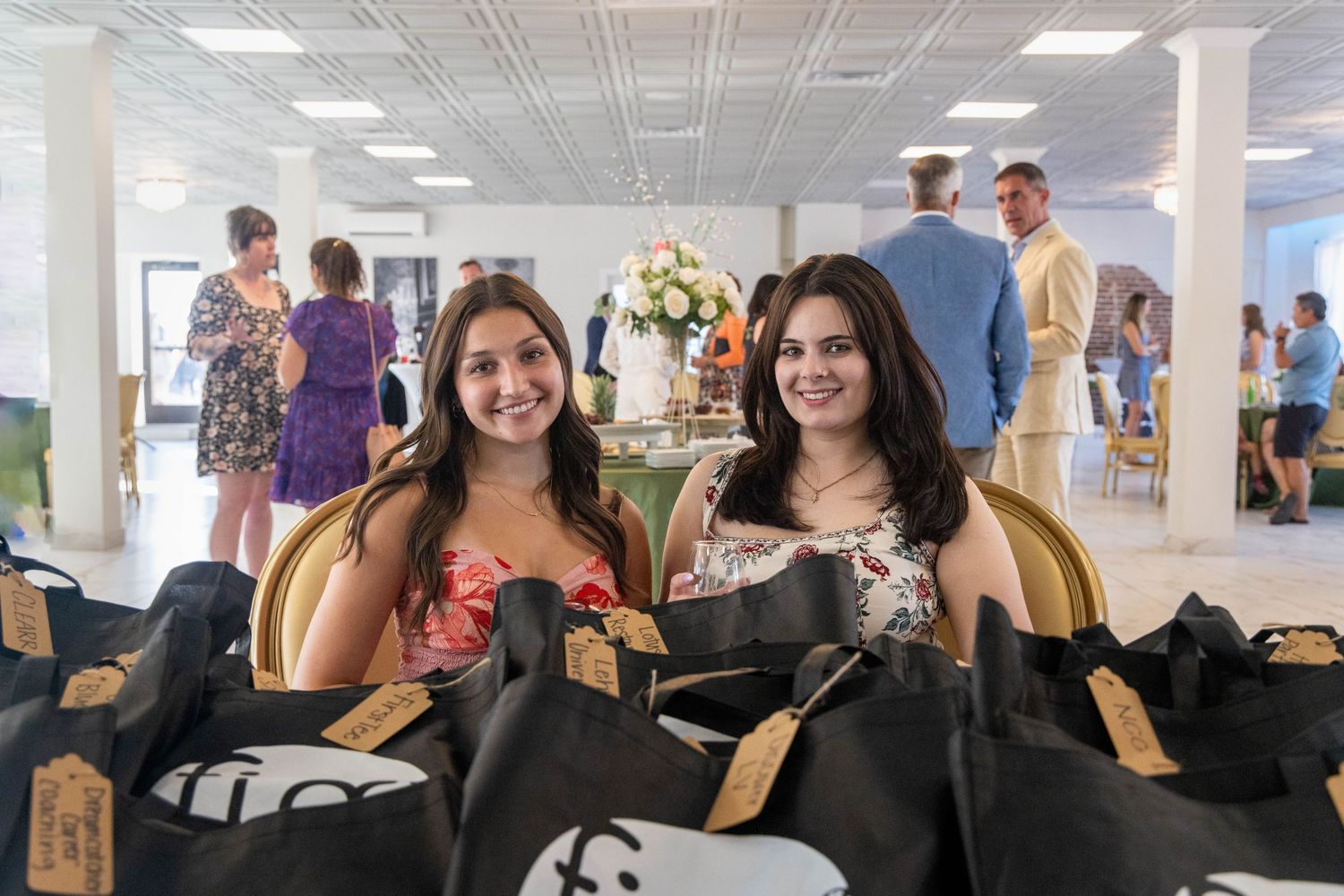 people smiling at a work function