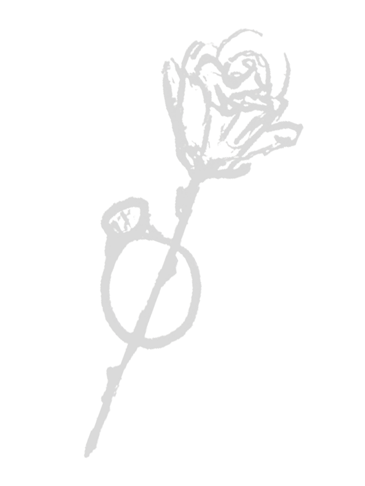 Line are of a wedding band with a rose going through it.