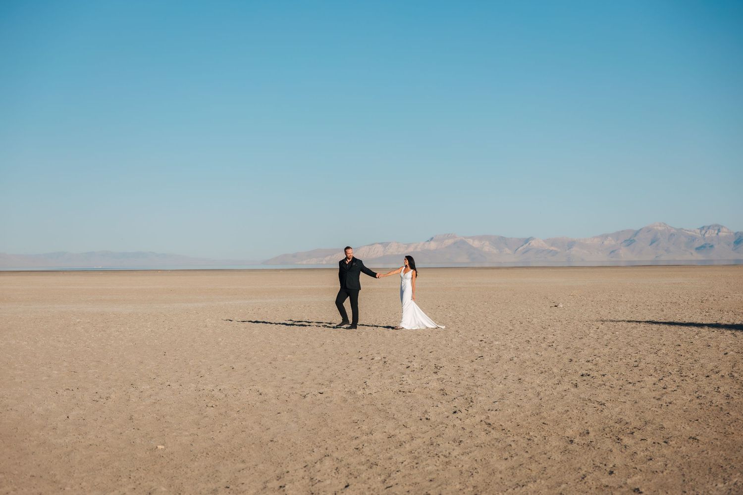 Calgary travel wedding and elopement photographer. Utah salt flats elopement pictures. Banff wedding pictures. Spruce grove photographers