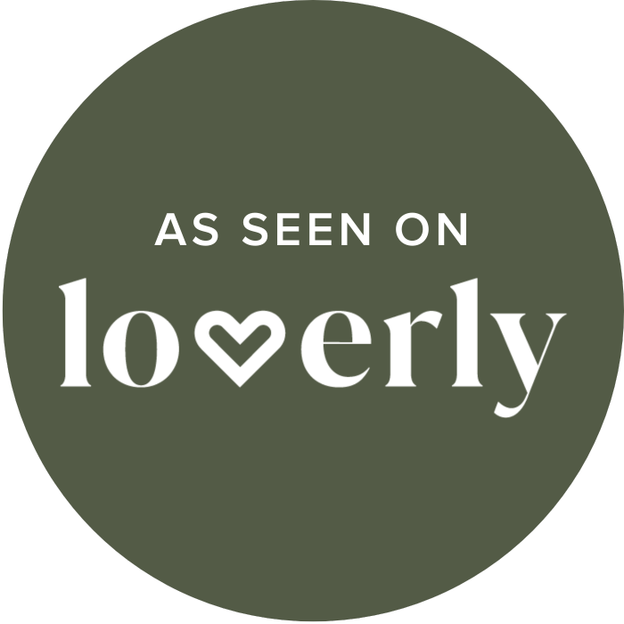 As seen on Loverly badge, a dark olive green circle with white text and heart logo.