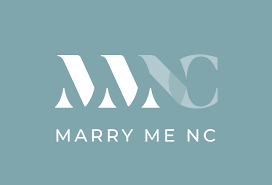 Modern blue and white logo design for Marry Me NC wedding services with elegant typography.