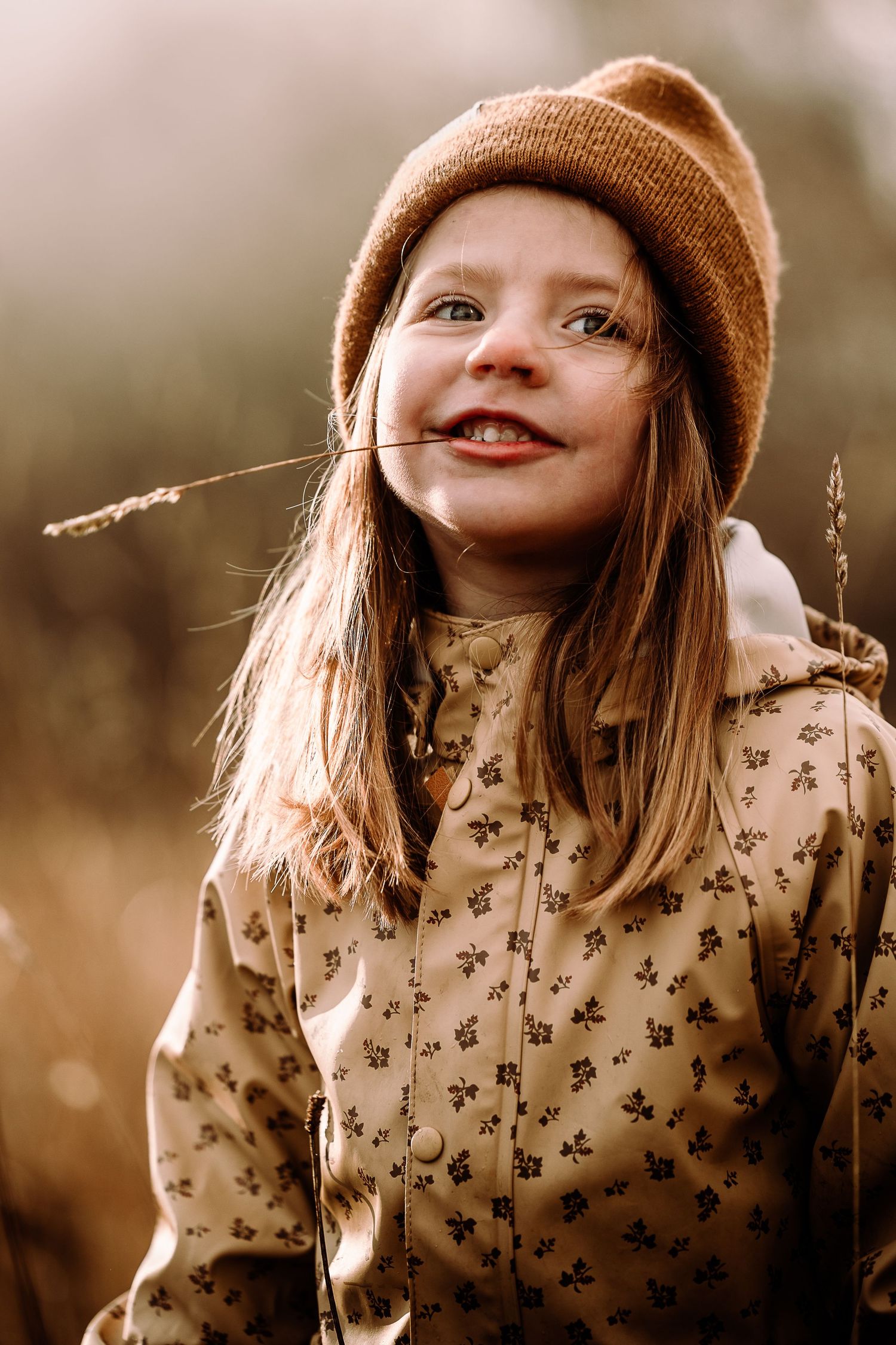 A series of outdoor portraits showing a person in a brown knit beanie and floral print top during golden hour lighting.