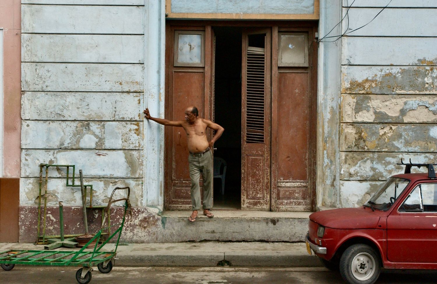 Man shirtless on Street - Cuba  - Photograph by Richard D. Schoenberg