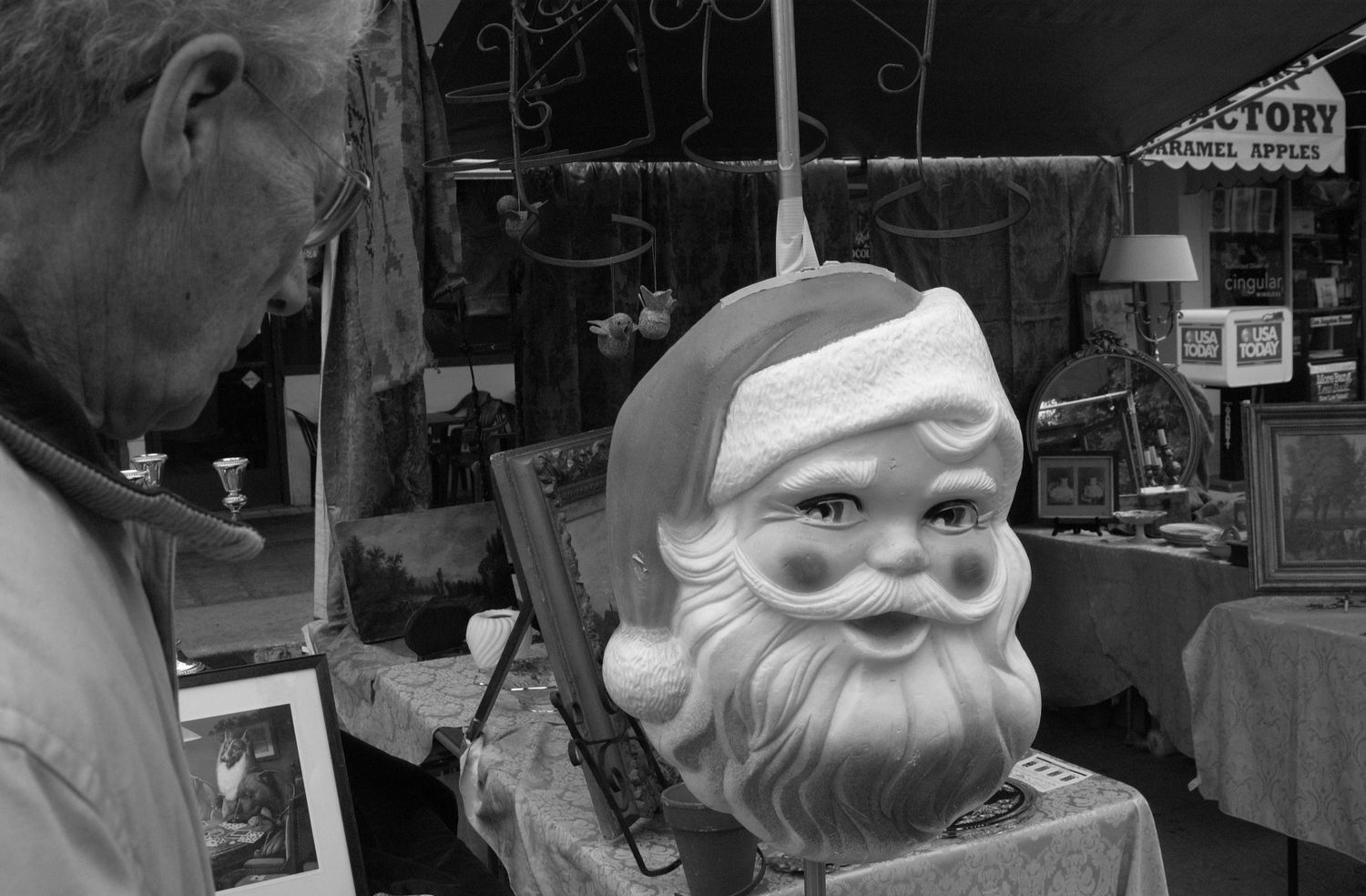 Workshop scene with decorative figurines and crafting materials.