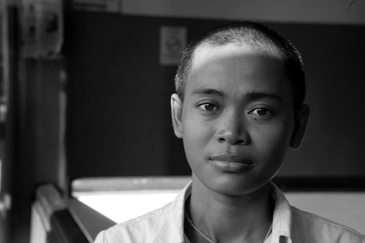 Series of black and white portraits captured in a documentary style.
