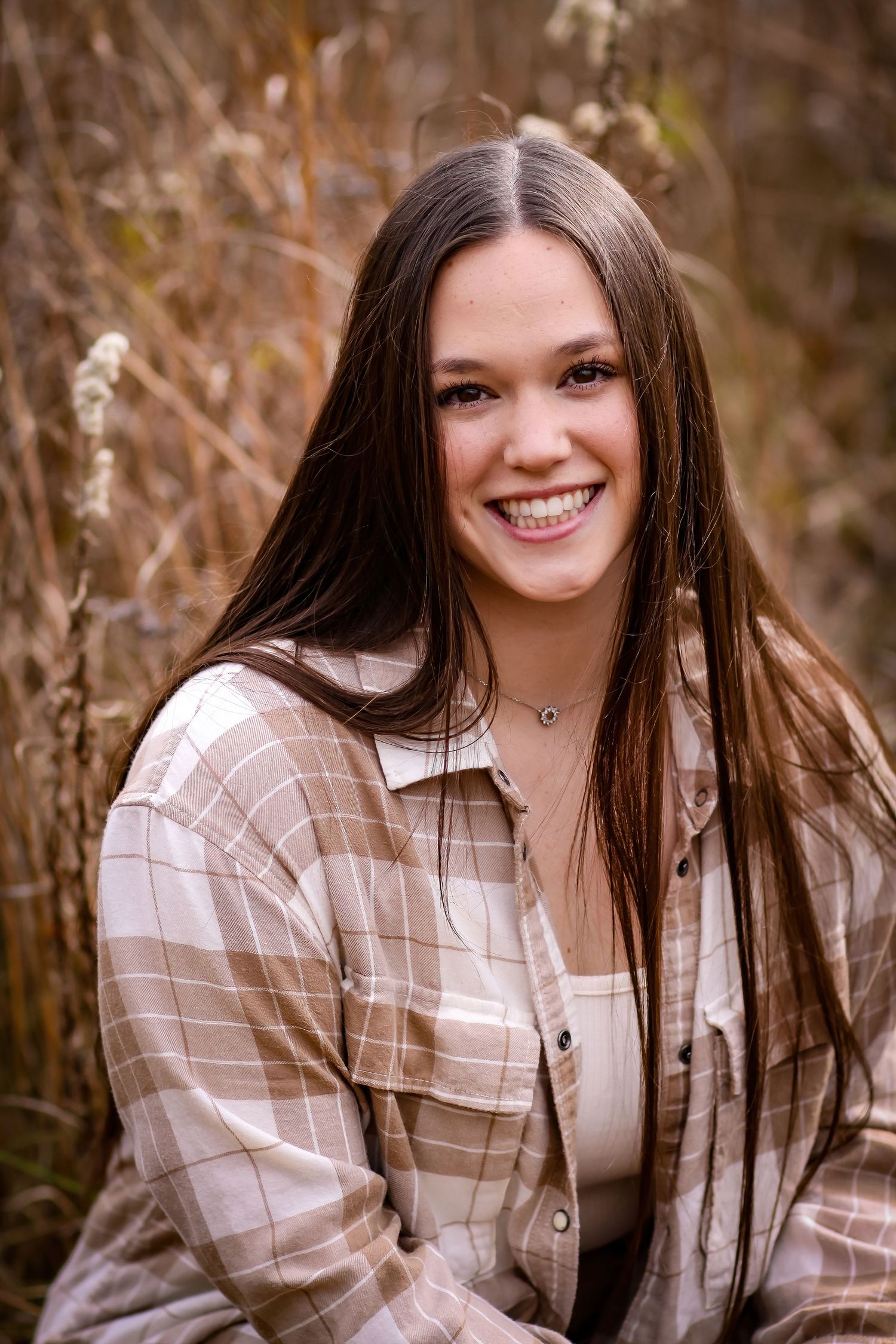 Senior session in a beautiful field