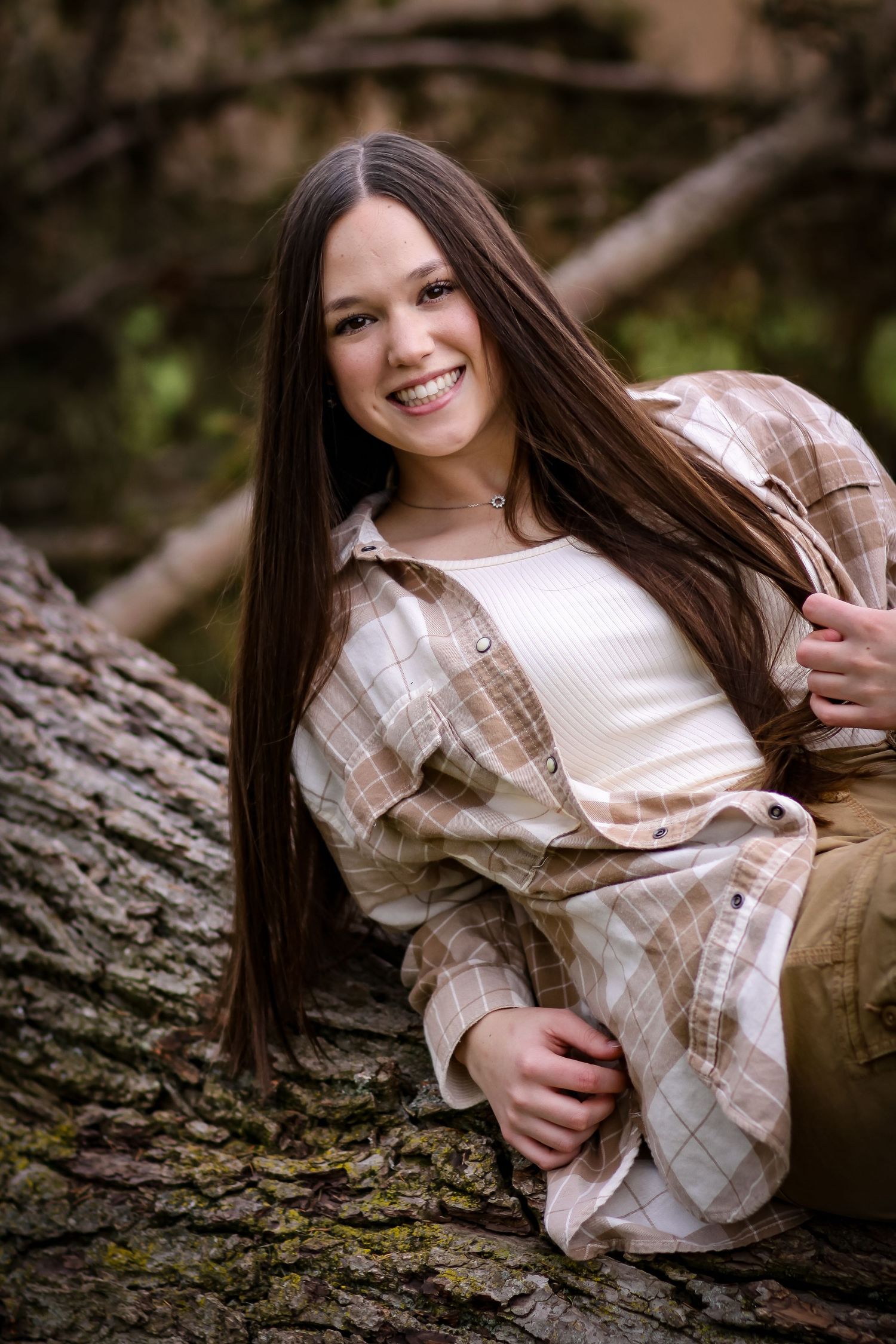 Senior session in a wooded area of a local park