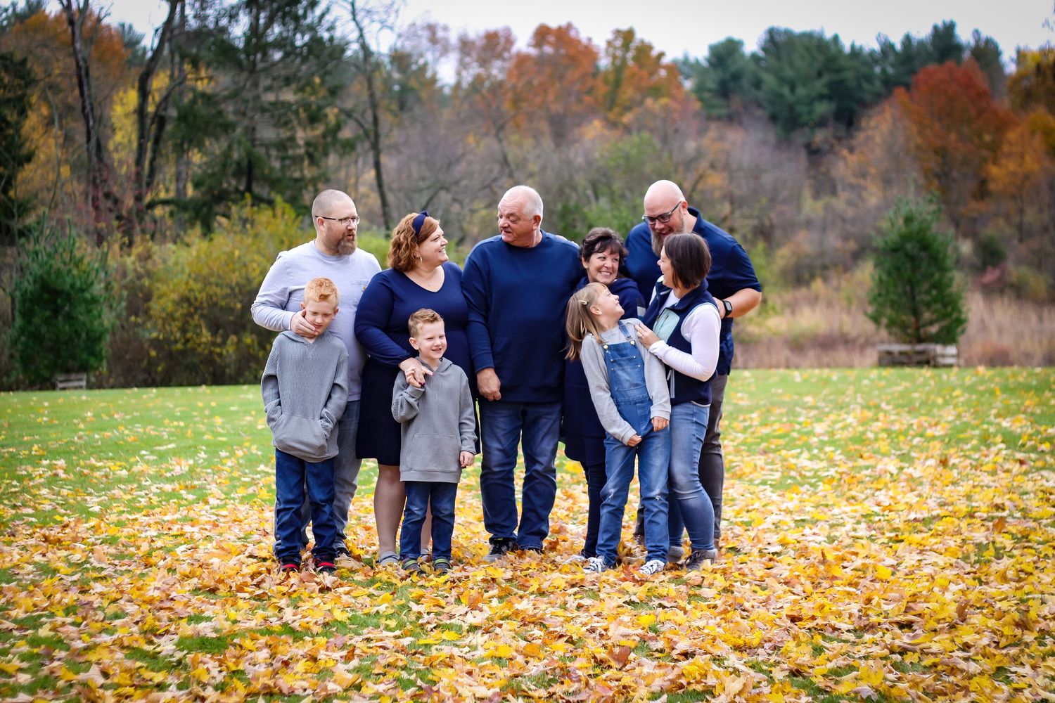 Family session with playful moments captured at a park.