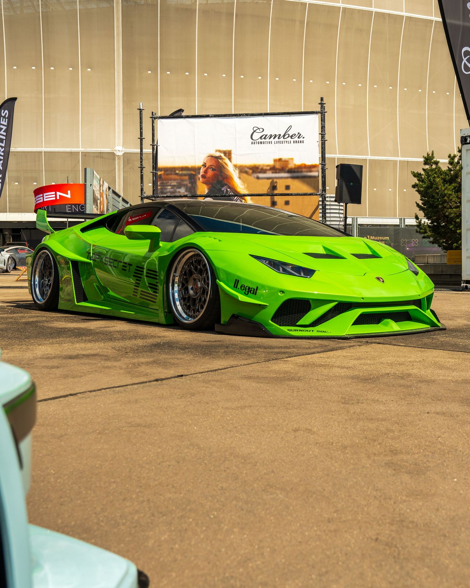 A sequence of photos showing a bright lime green sports car displayed in a parking lot.