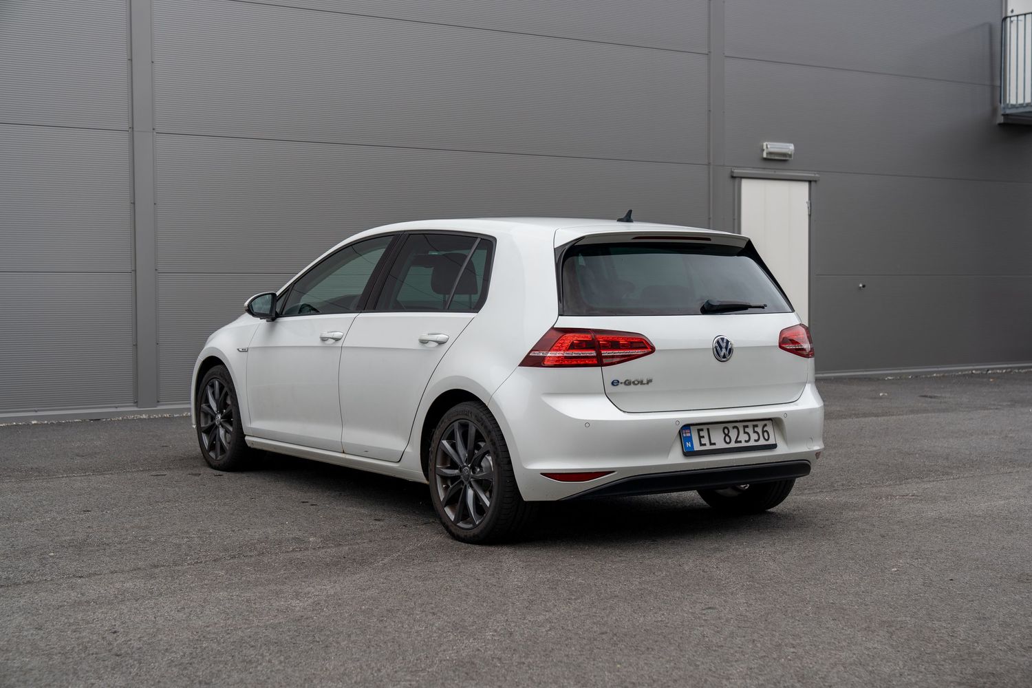 Multiple angles of a lowered white Volkswagen Golf GTI showing sporty stance and profile.