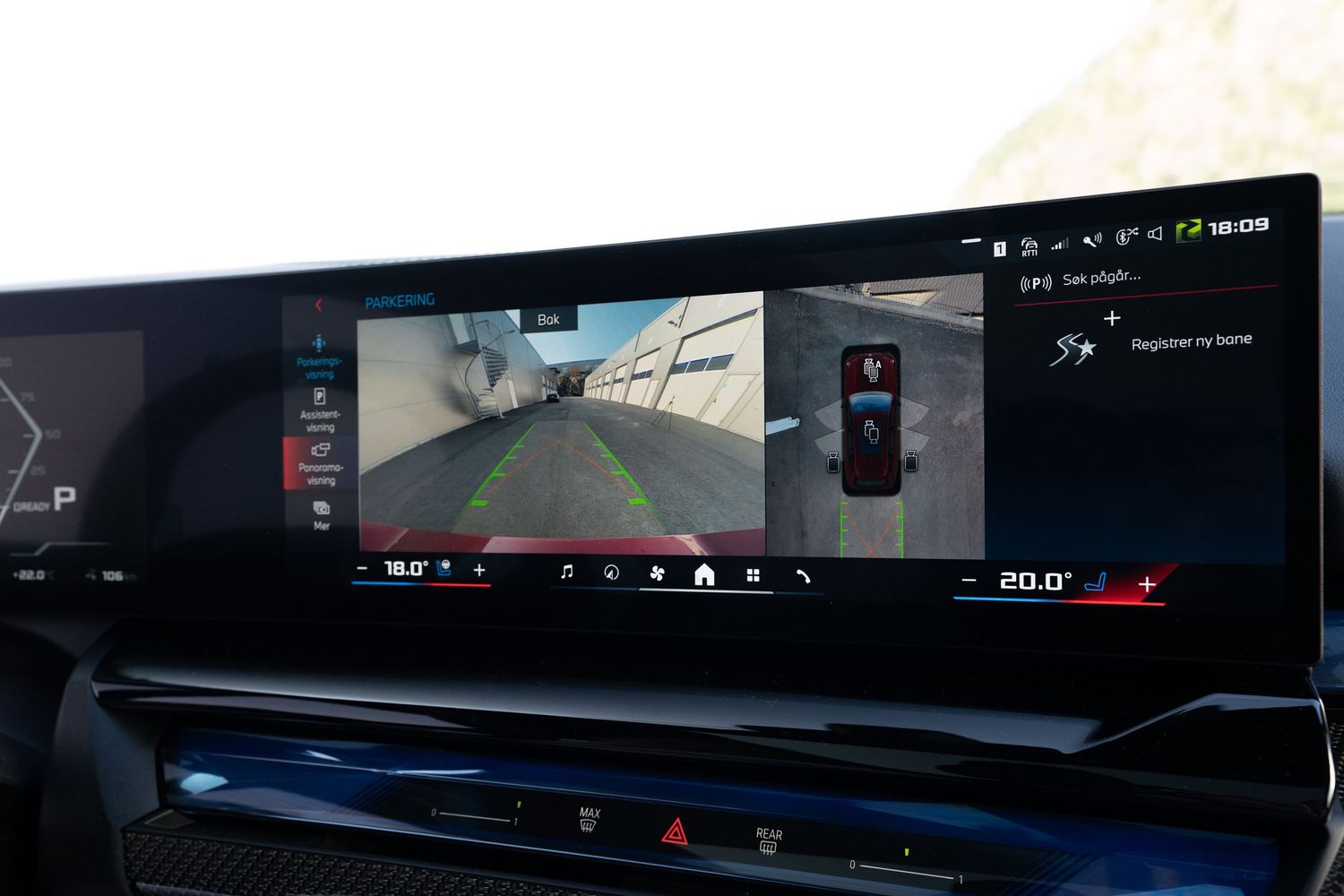 Wide digital instrument display showing vehicle information and navigation interface.