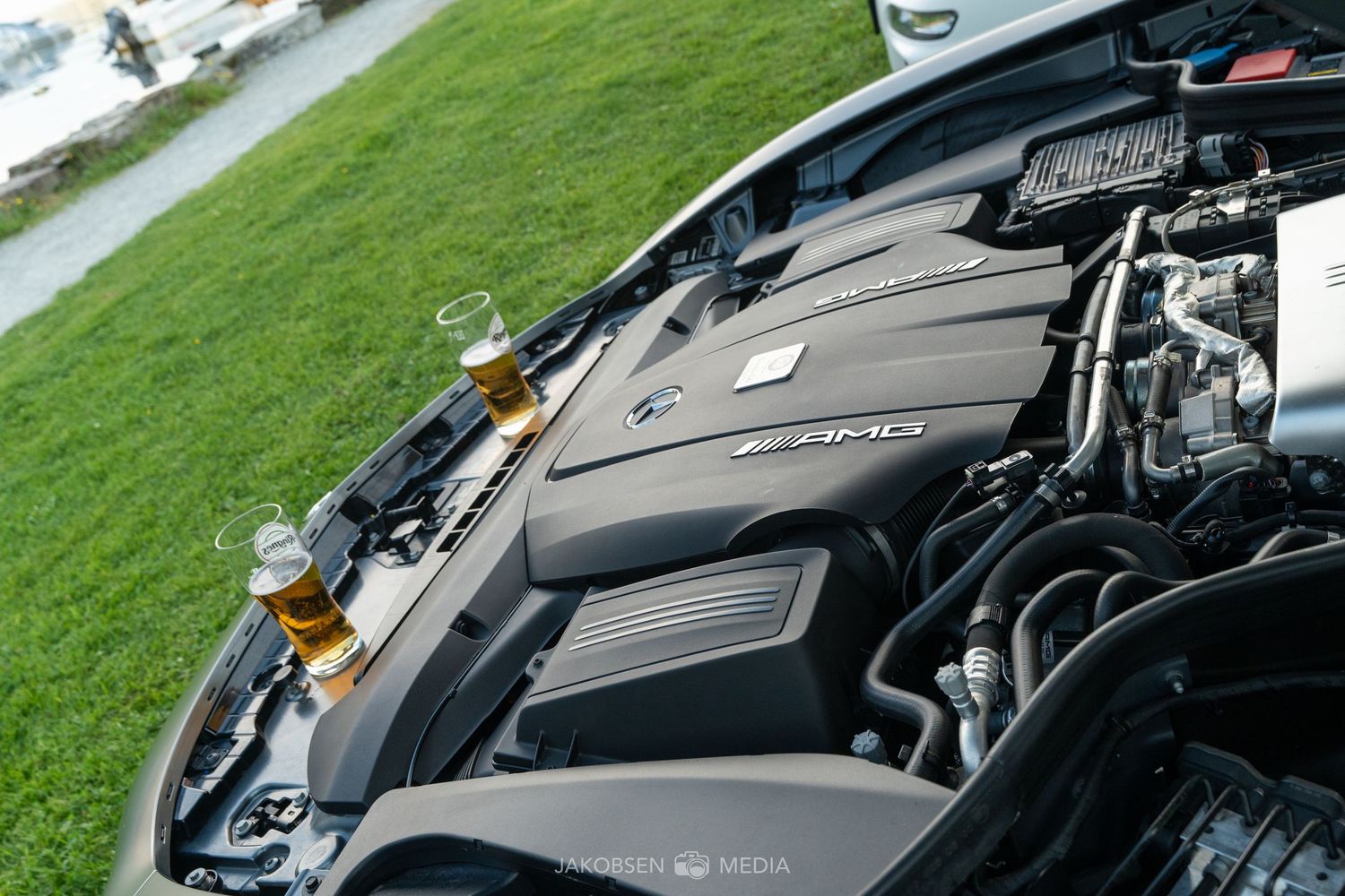 Close-up view of a modern performance car engine bay showing detailed mechanical components.