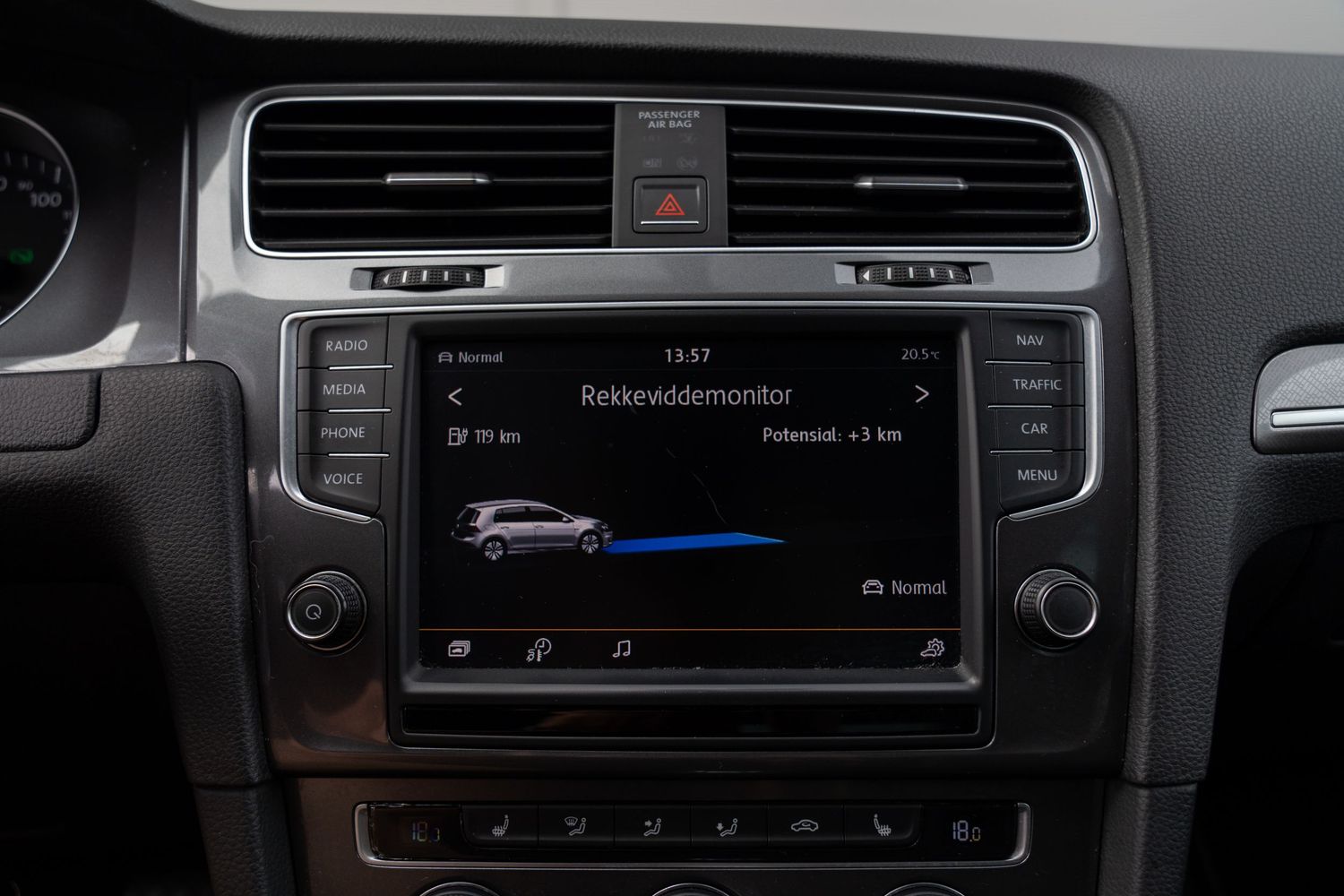 Dashboard center console showing climate controls and entertainment system interface.