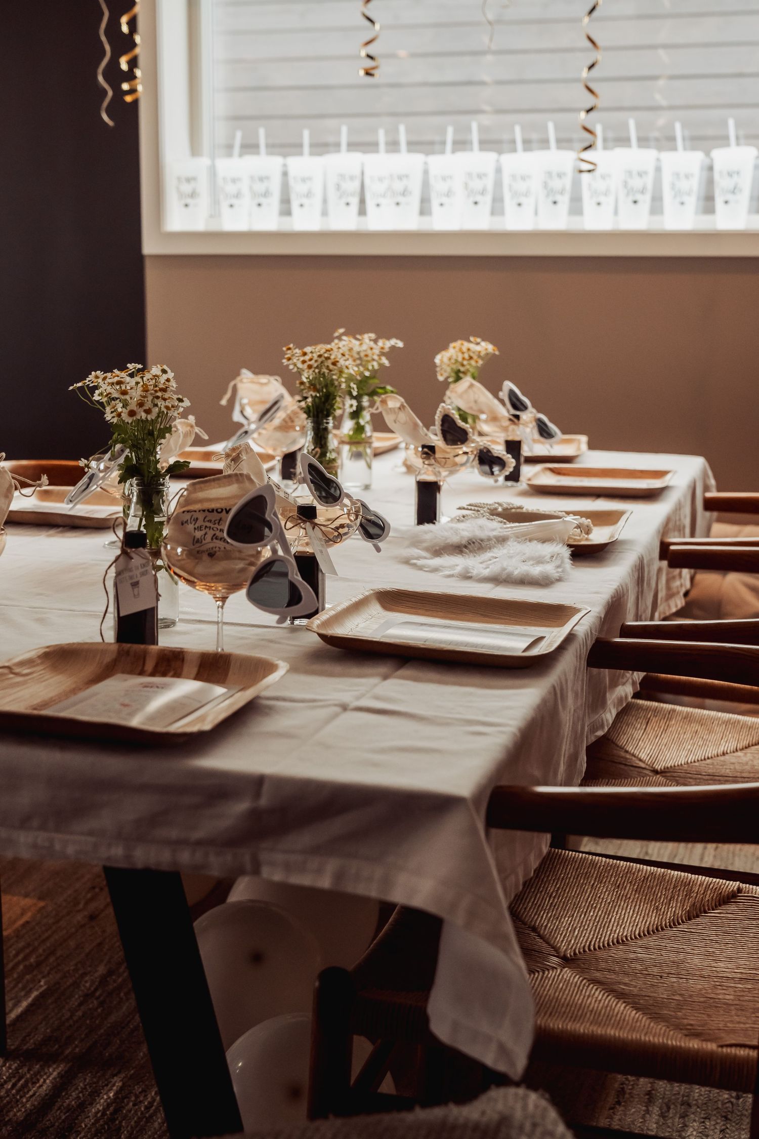 Elegant table setting with floral centerpieces and place settings for a special occasion.
