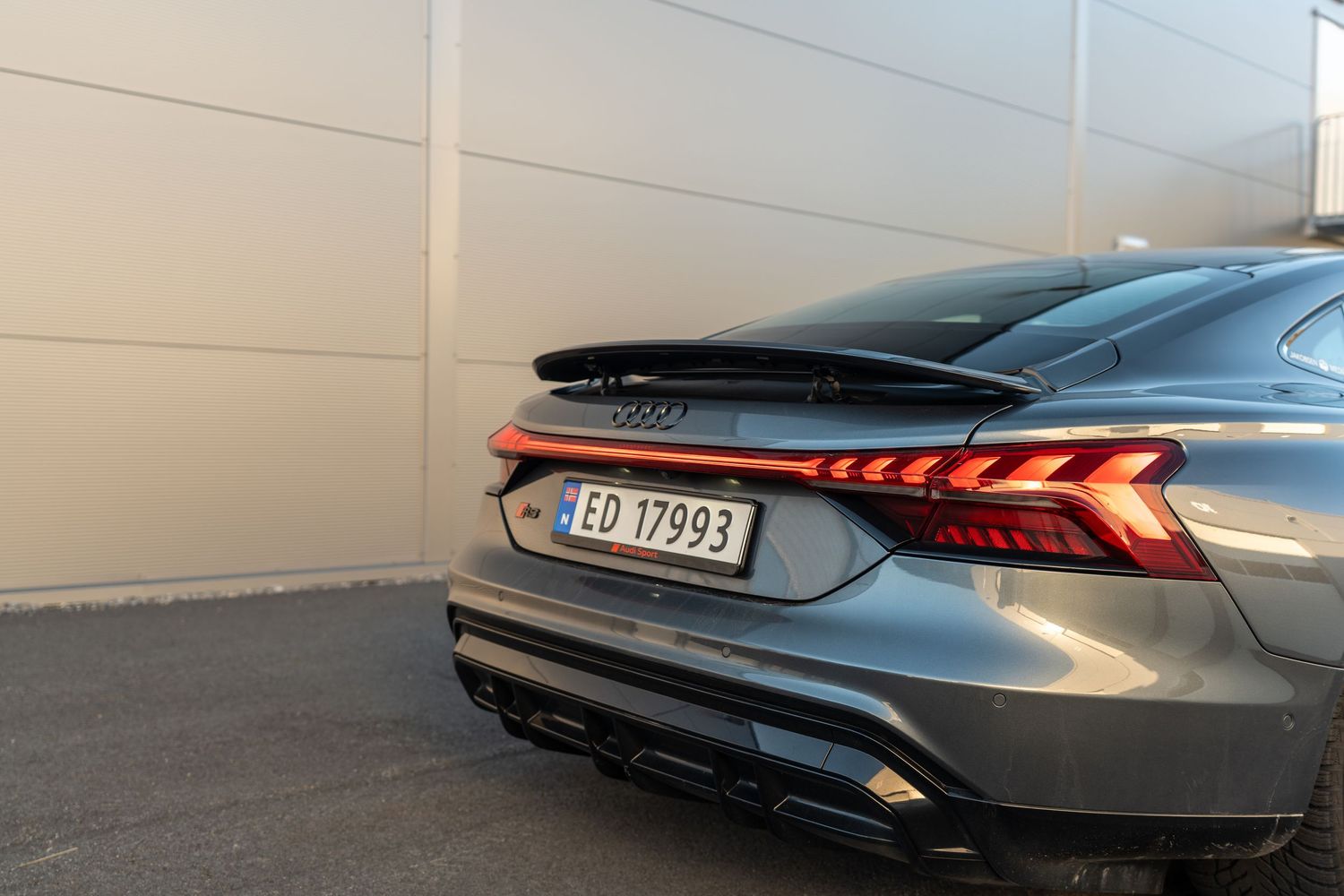Close-up of Audi RS e-tron GT rear quarter panel and LED taillights.