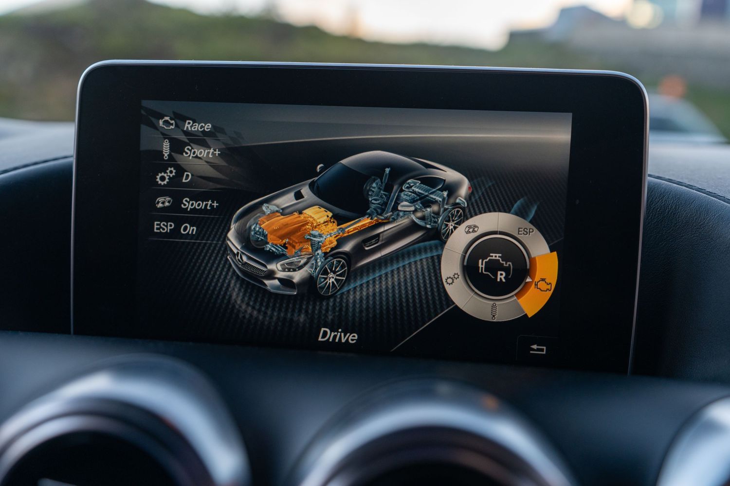 Vehicle diagnostics screen showing drivetrain layout on infotainment display.