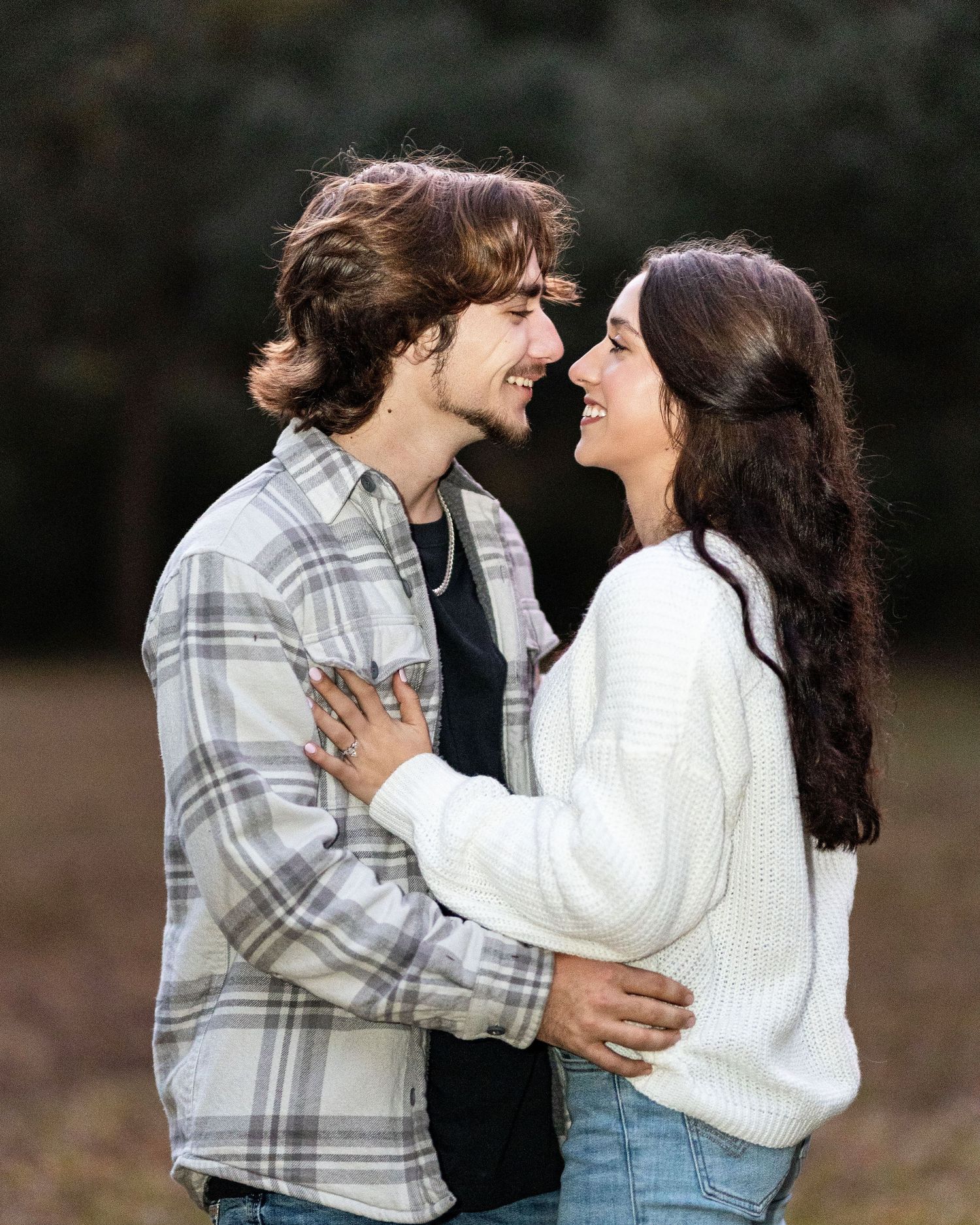 A romantic couple in casual attire sharing intimate moments in a series of outdoor photos.