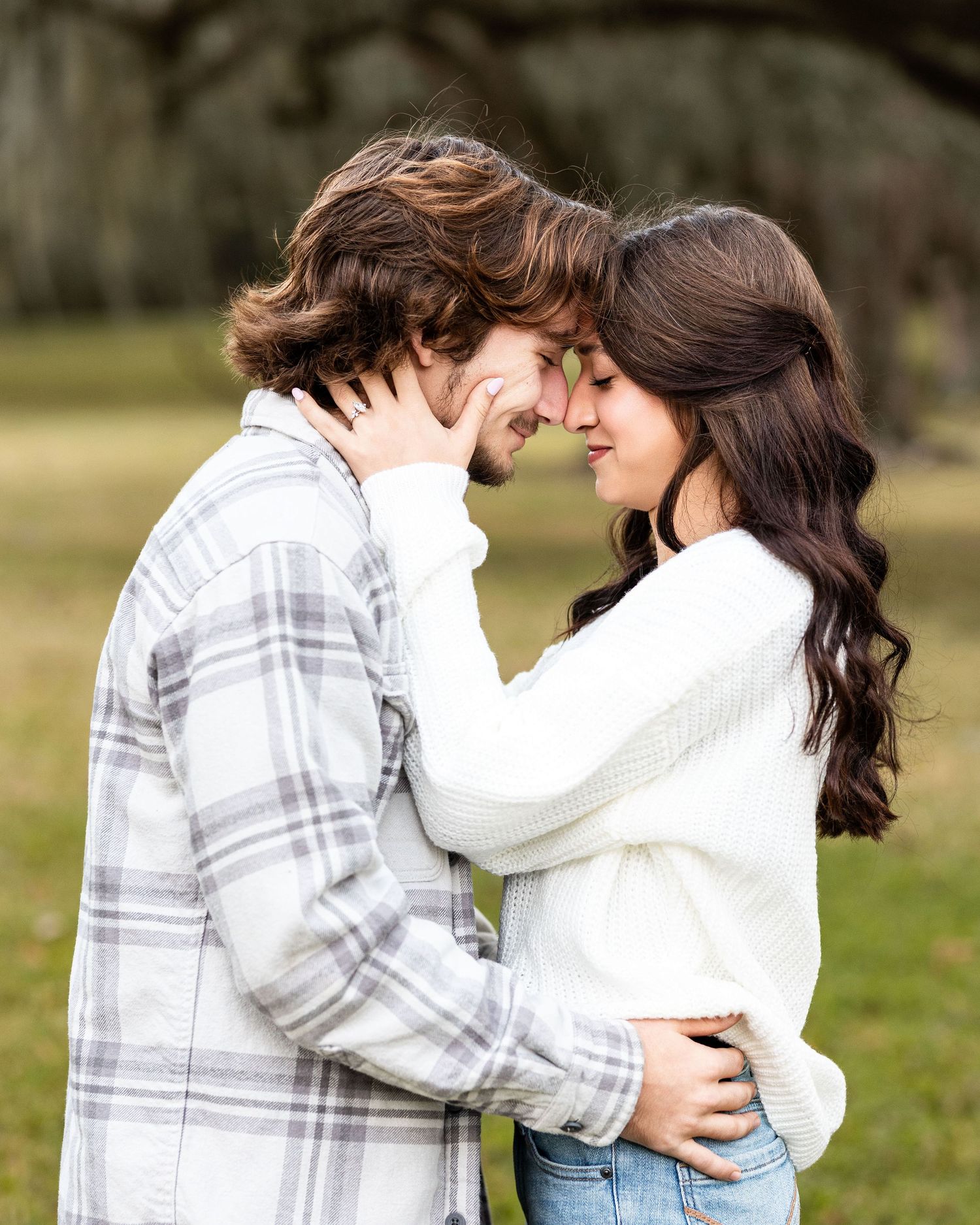 A couple in casual attire embracing and sharing tender moments in a series of romantic outdoor photos.