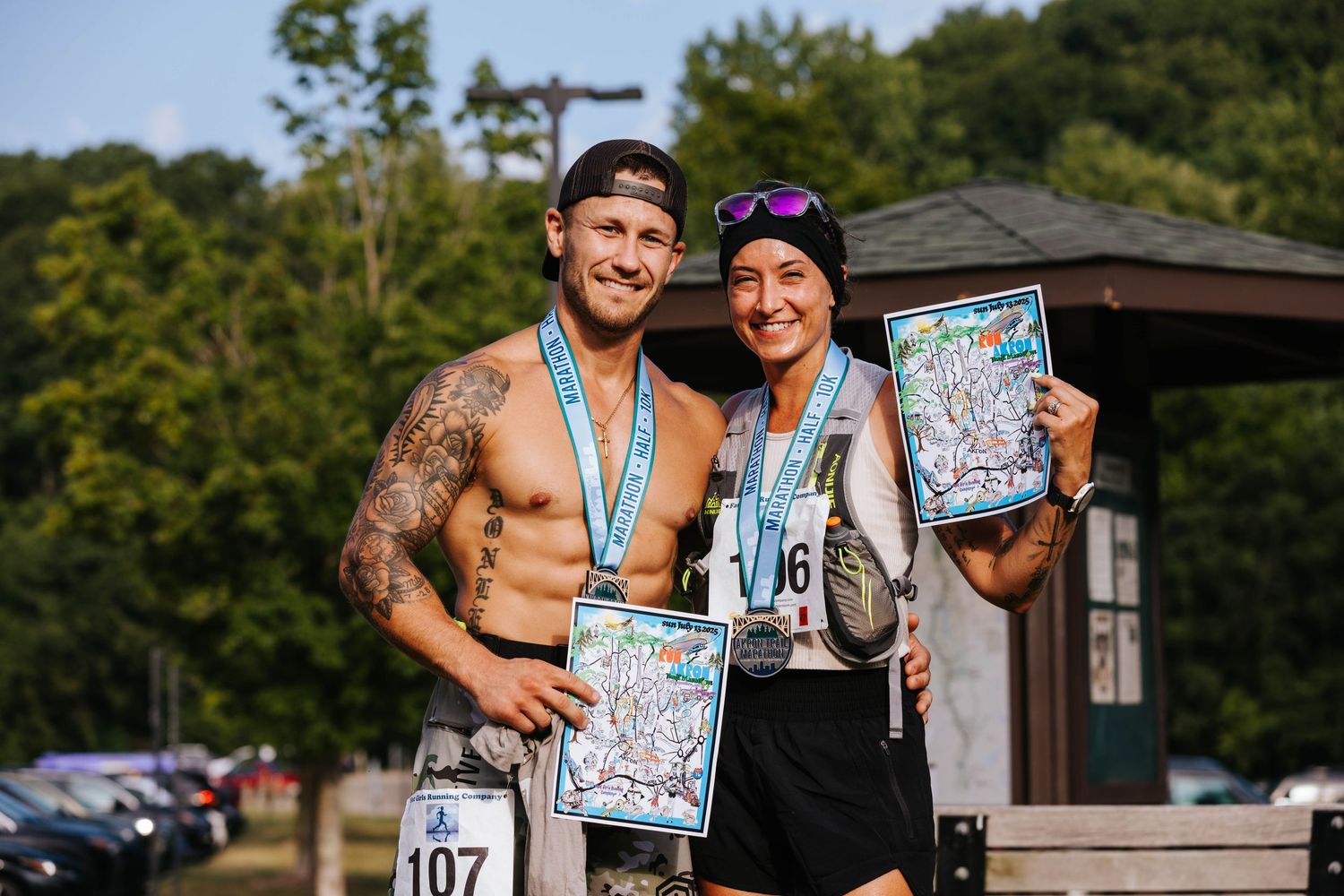 Akron Trail Marathon, couple poses with awards, photographed by Mal McCrea