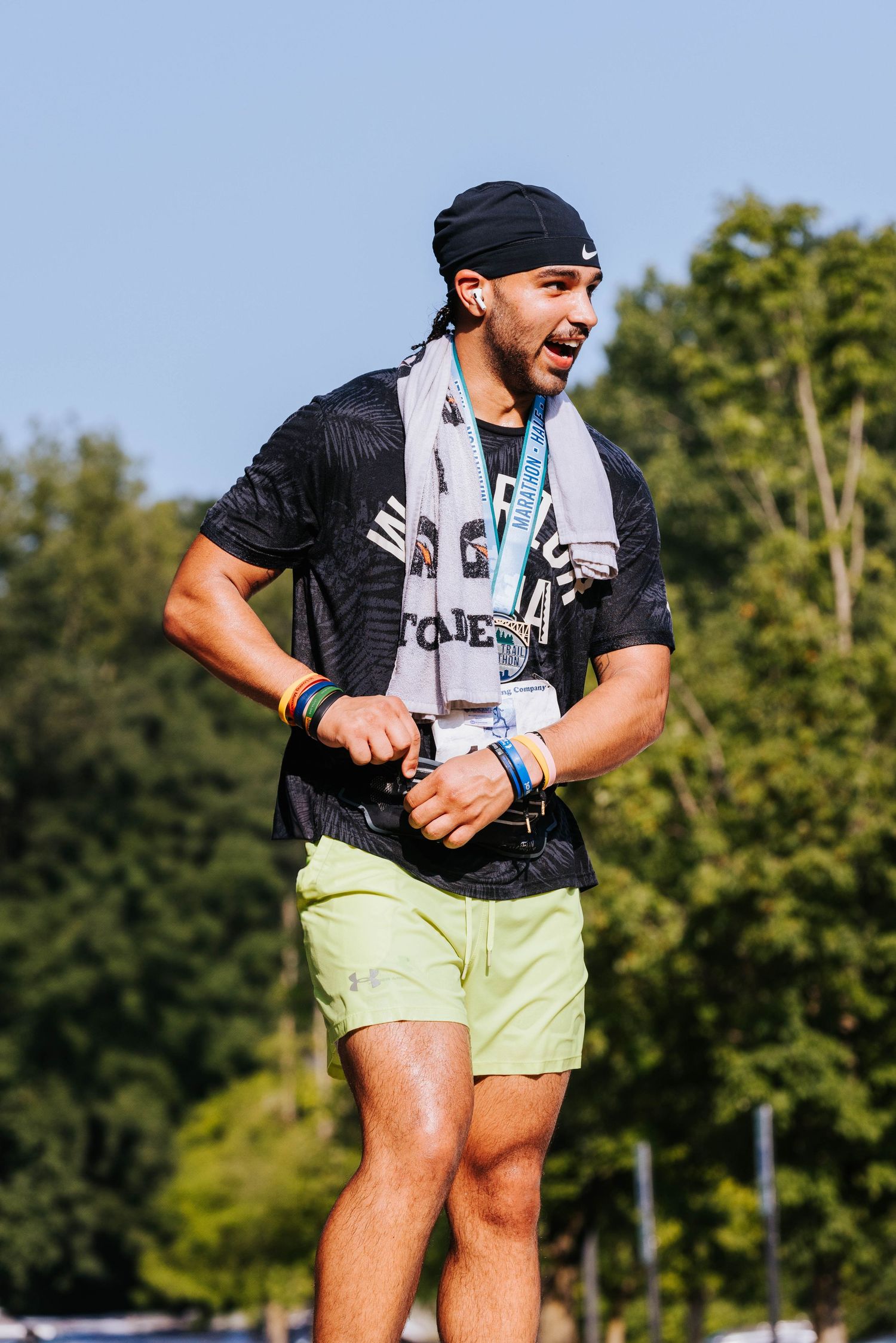 Akron Trail Marathon, runner celebrates finish, photographed by Mal McCrea