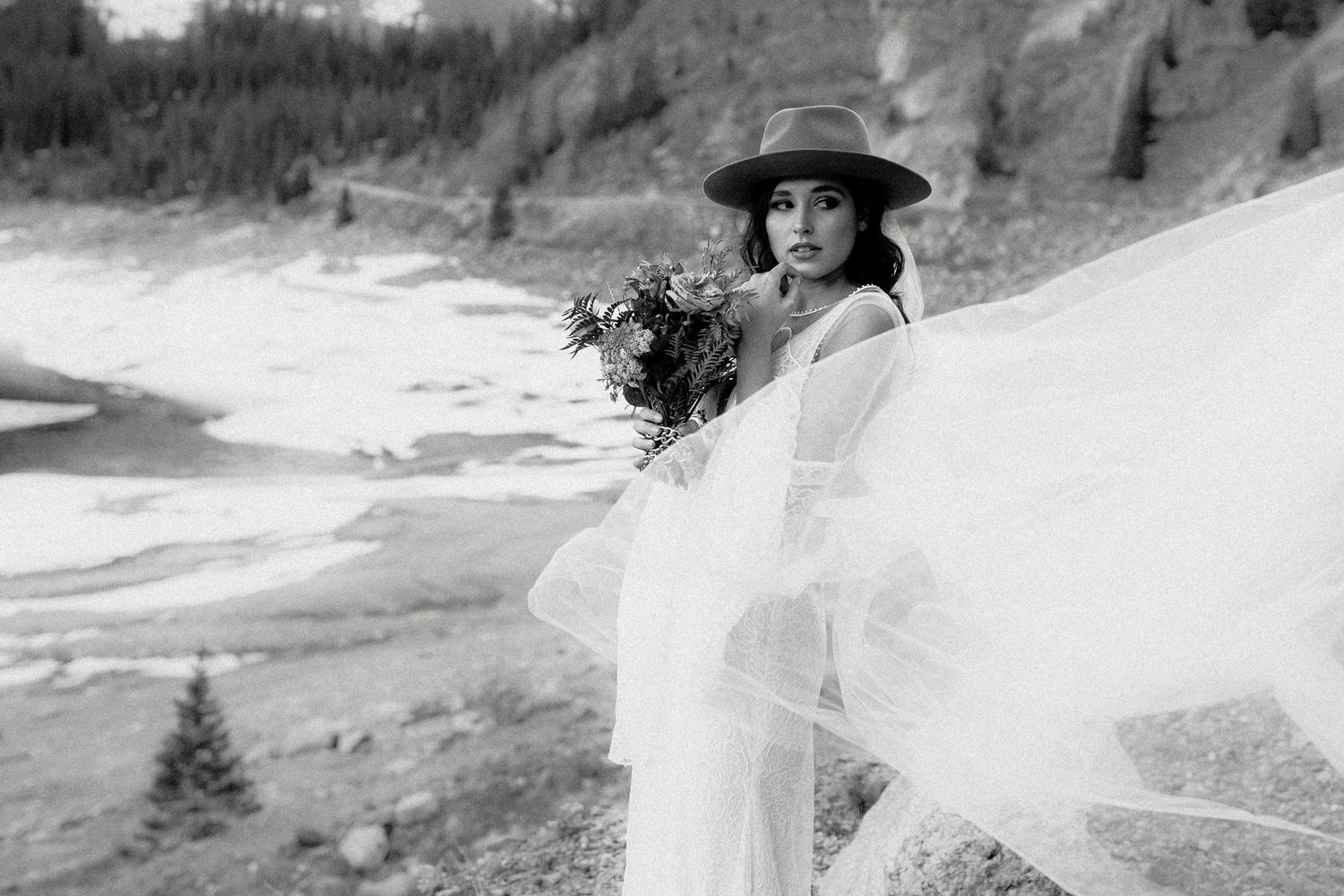 Photo of a rainy day elopement in the Colorado mountains