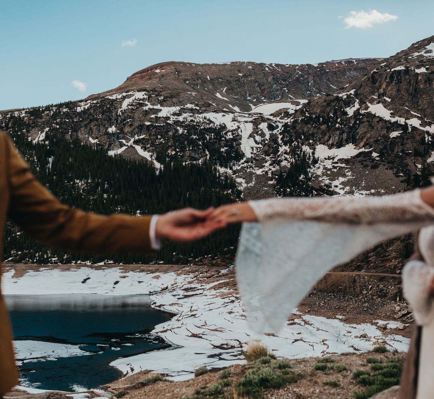 Photo of a rainy day elopement in the Colorado mountains