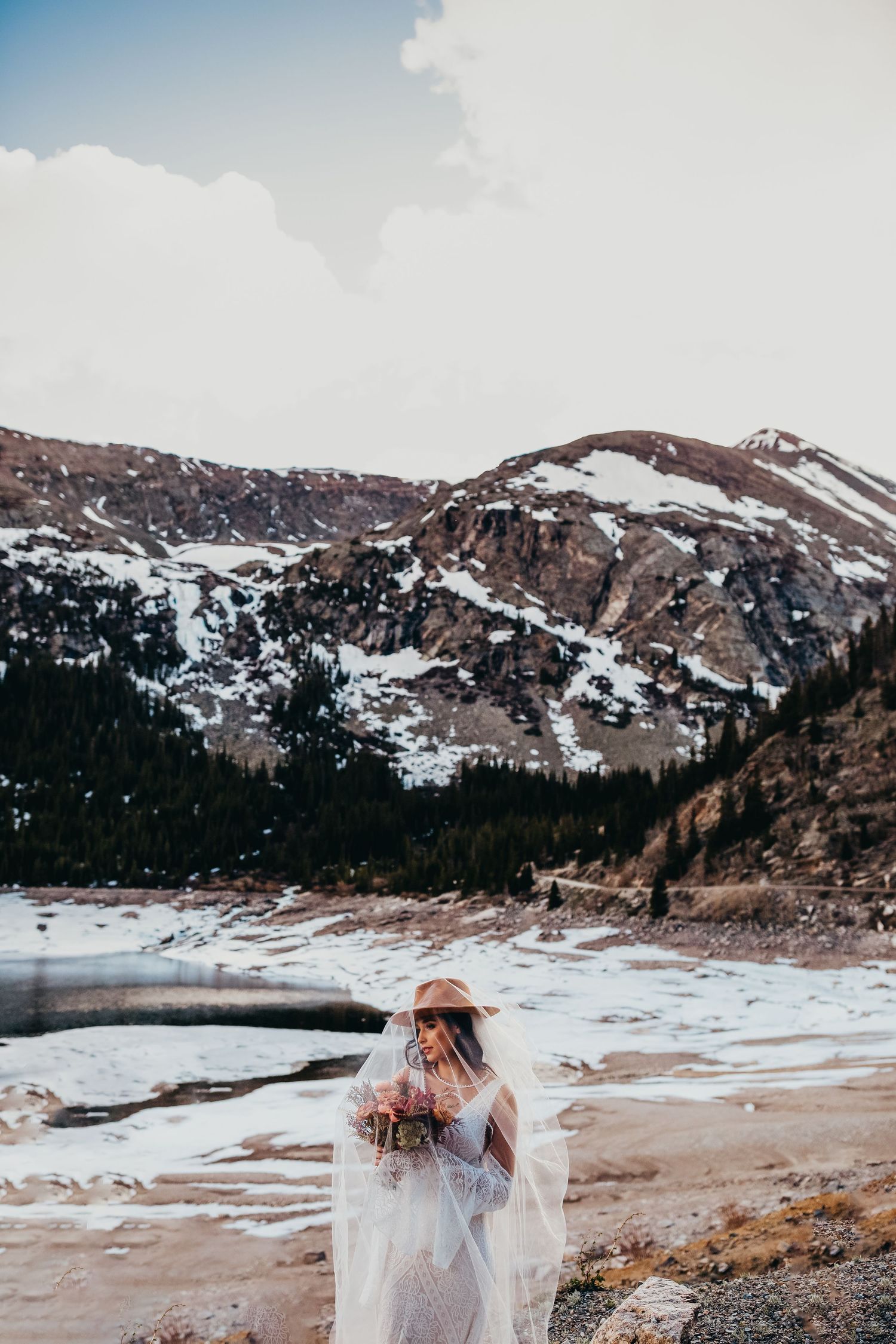 Photo of a rainy day elopement in the Colorado mountains