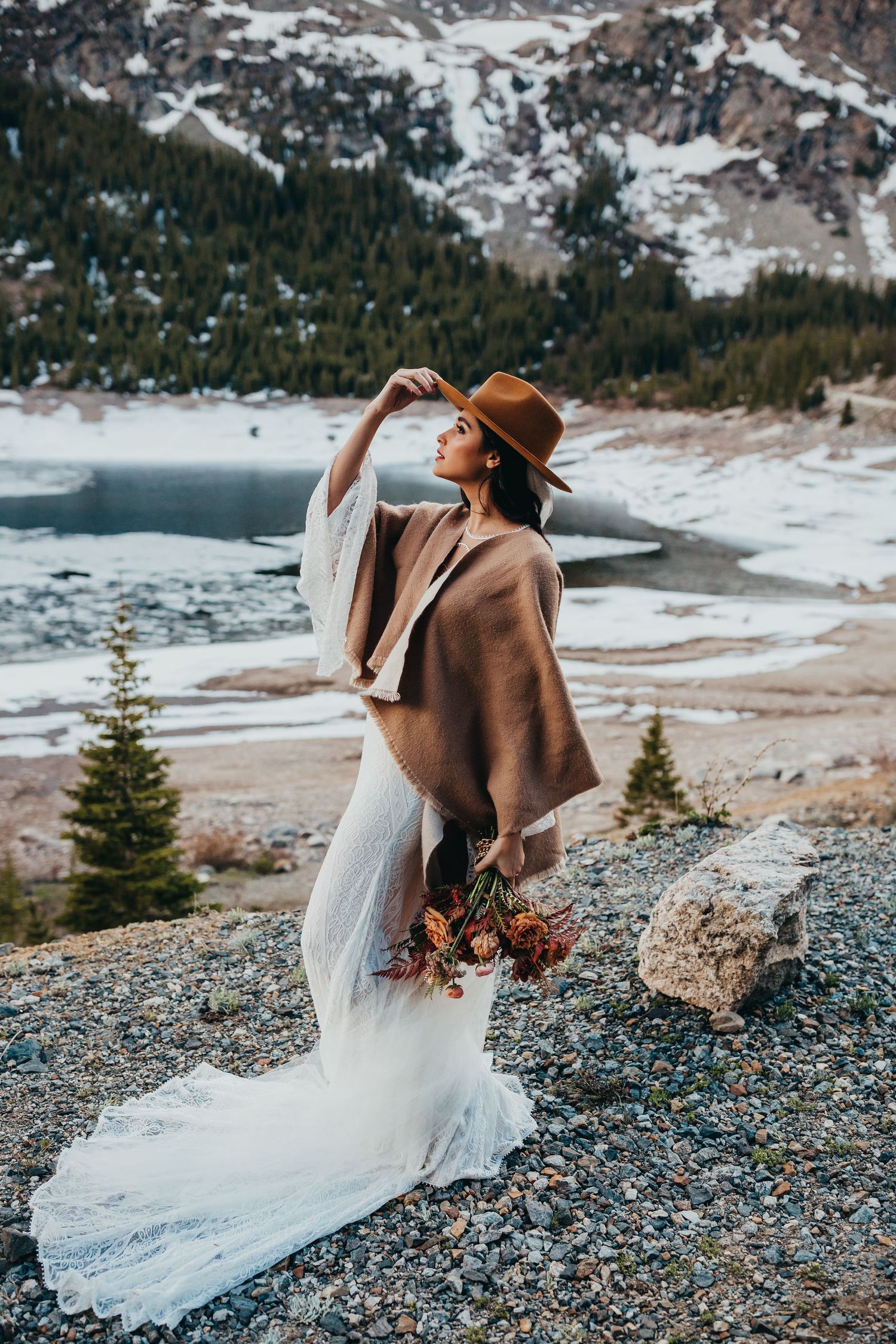 Photo of a rainy day elopement in the Colorado mountains