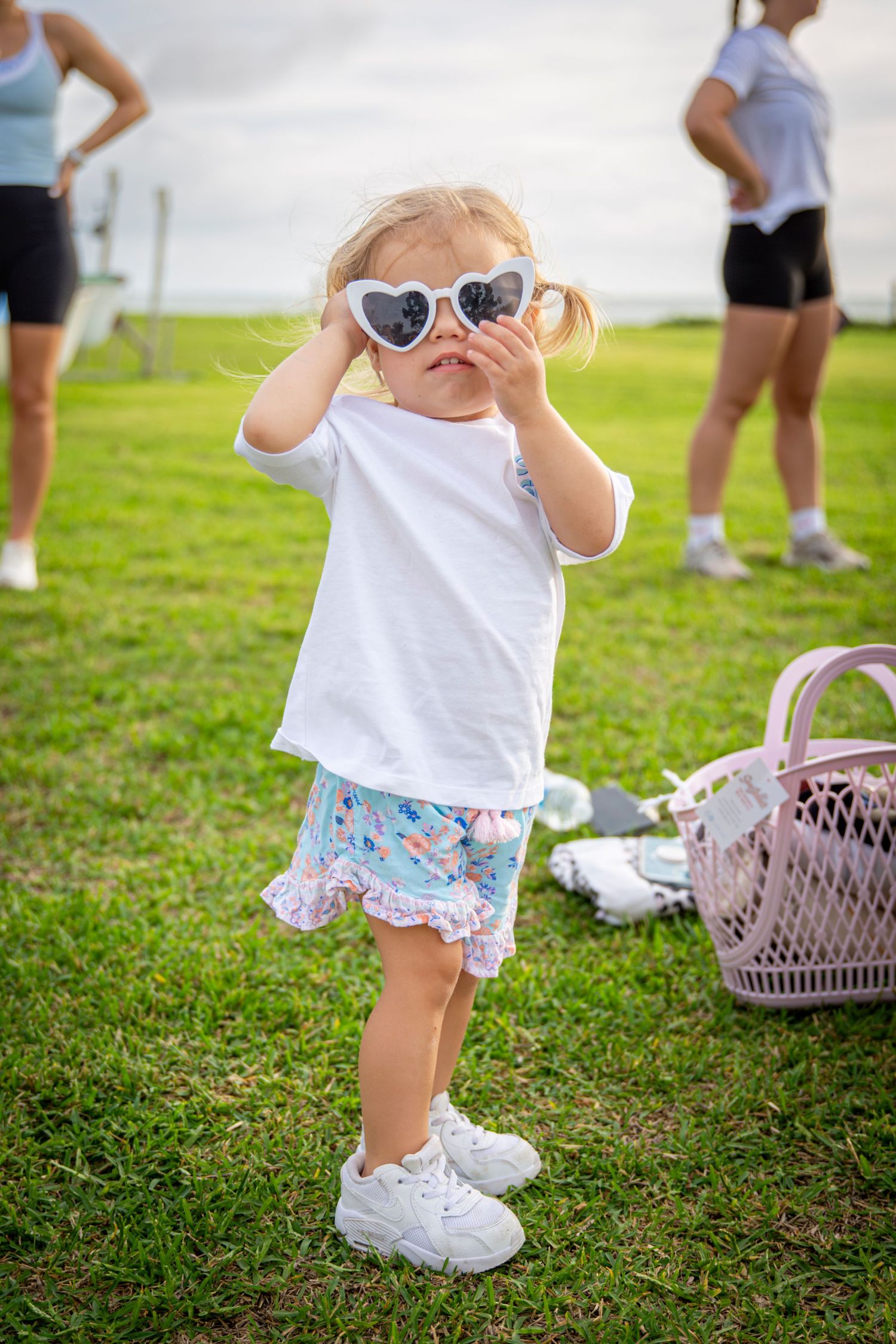 Girl wearing heart shaped sunglasses and salty steps shirt at yeppoon community event