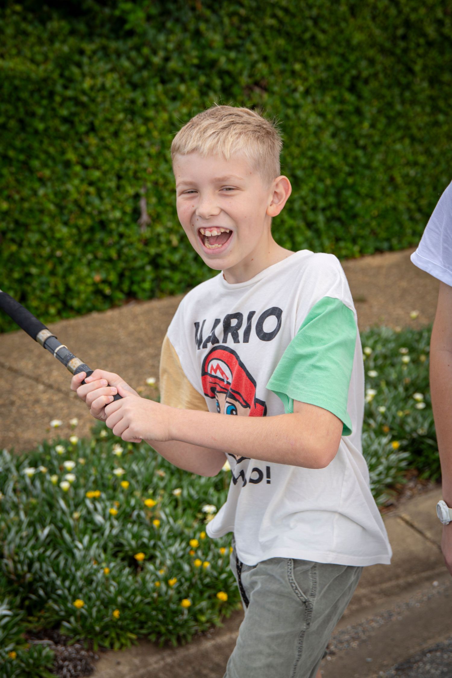 Child smiling at camera at Salty Steps community walking event Yeppoon
