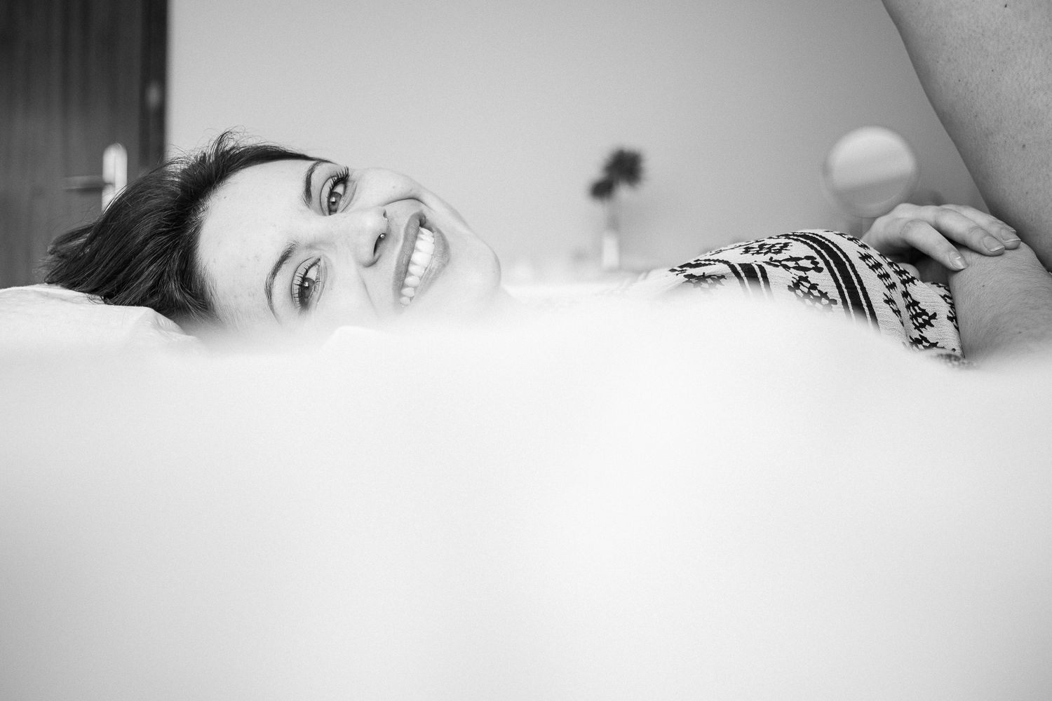 Black and white portrait series showing dramatic shadows and lighting effects.