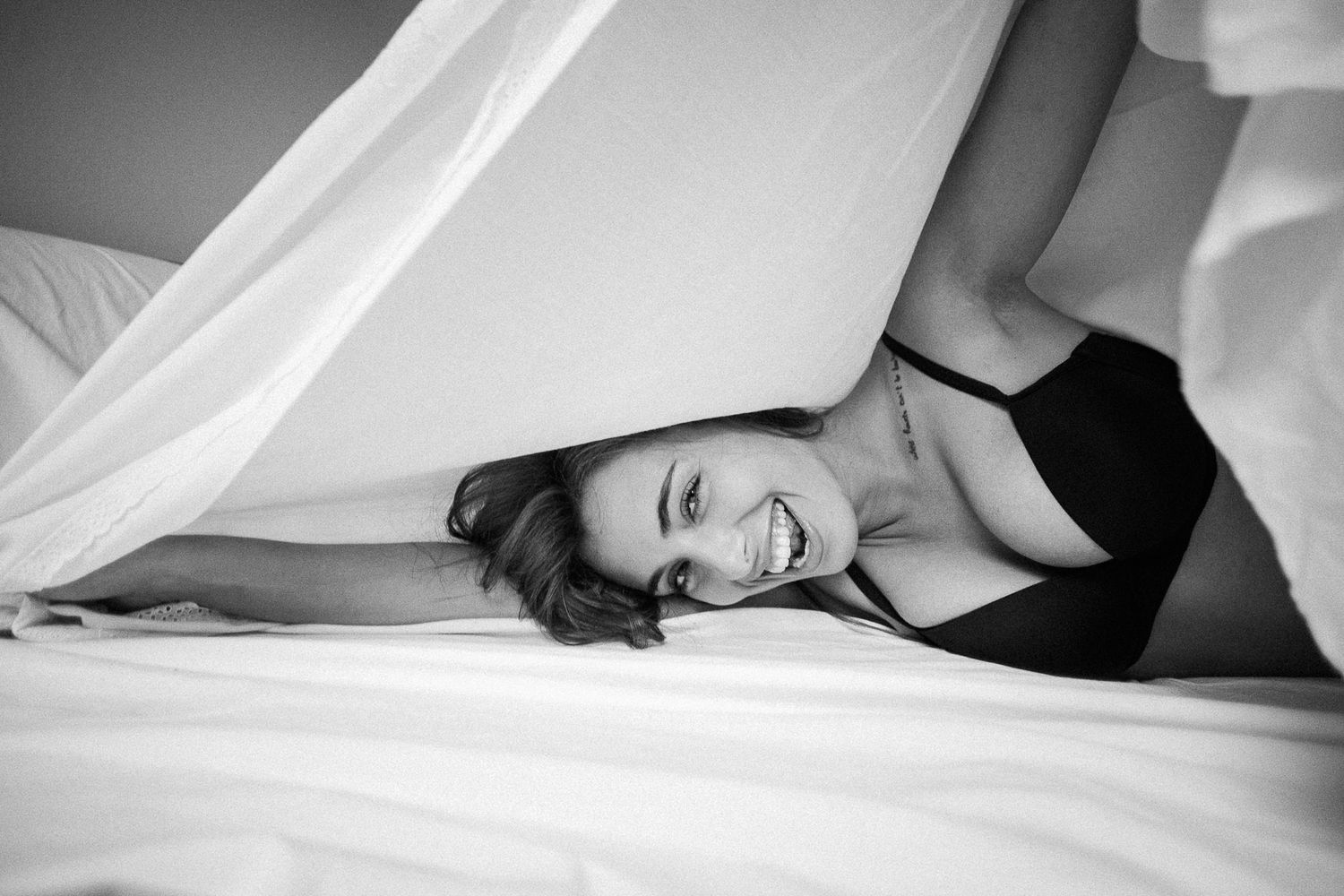 Intimate black and white portrait series with soft natural lighting.