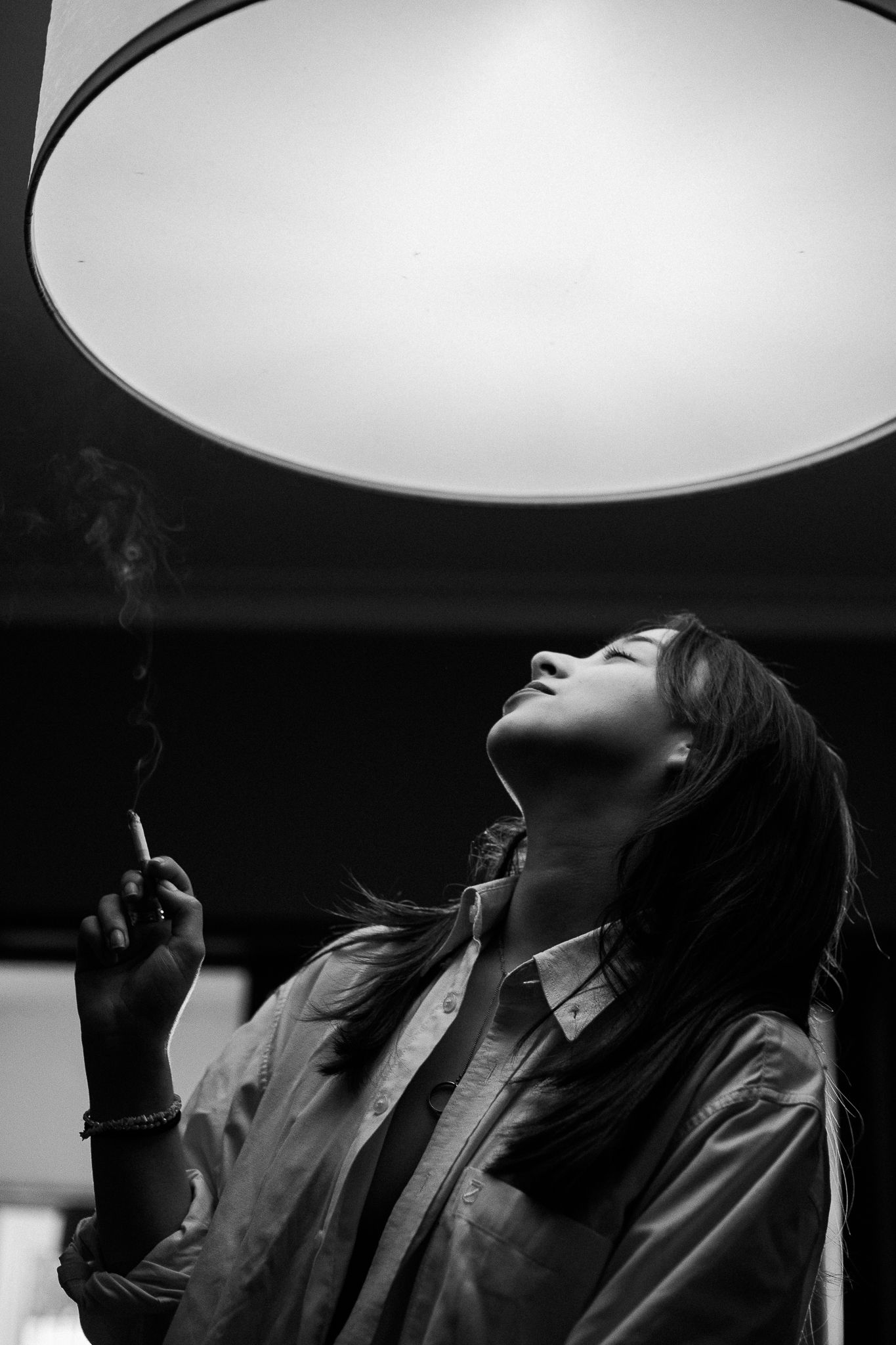 Artistic black and white series featuring dramatic lighting from above.