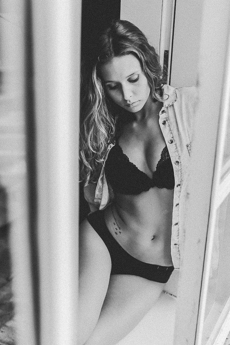 Artistic black and white photo series showing intimate boudoir portraits near window light.